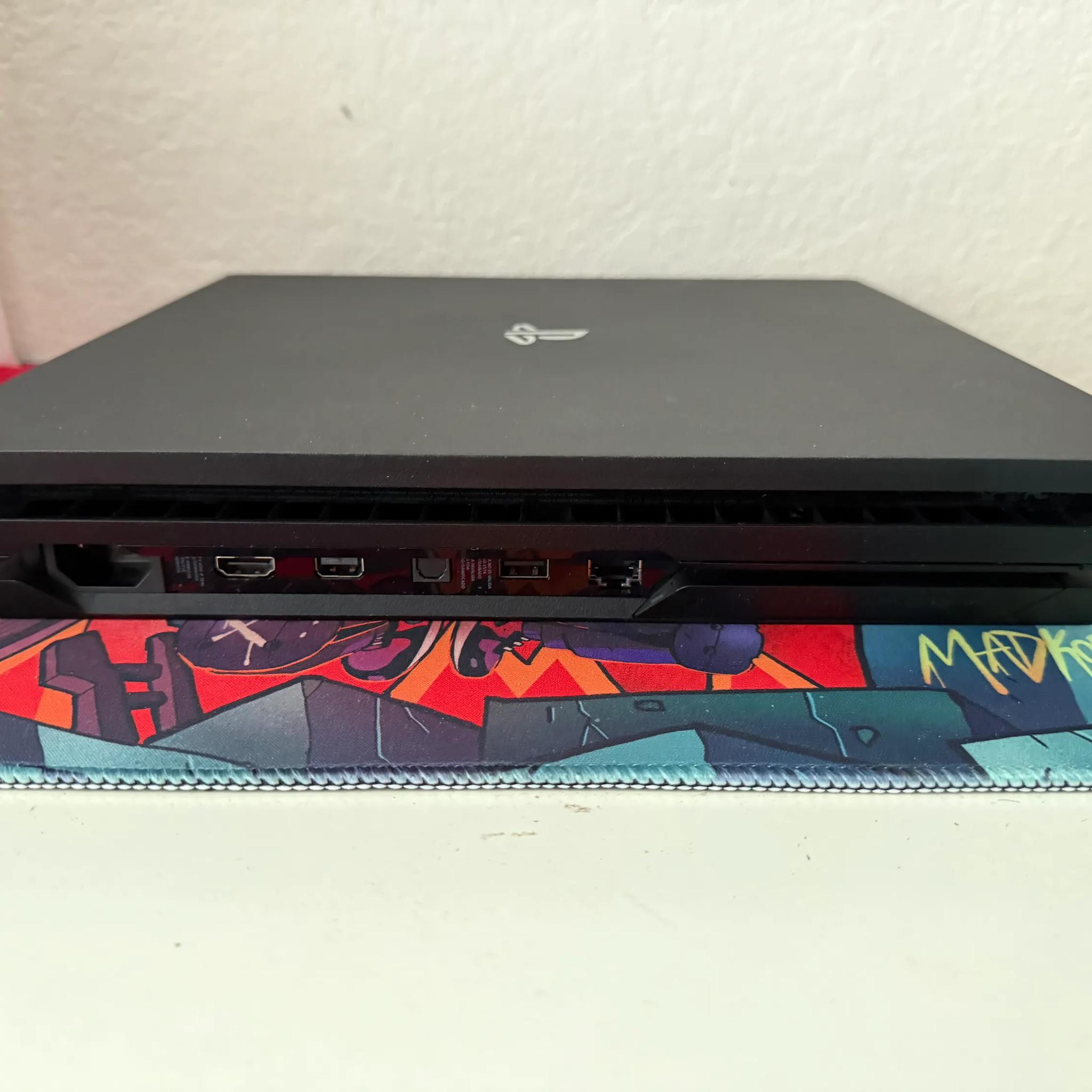 Sony PlayStation 4 Pro 1TB Console (Black) + 7 Games