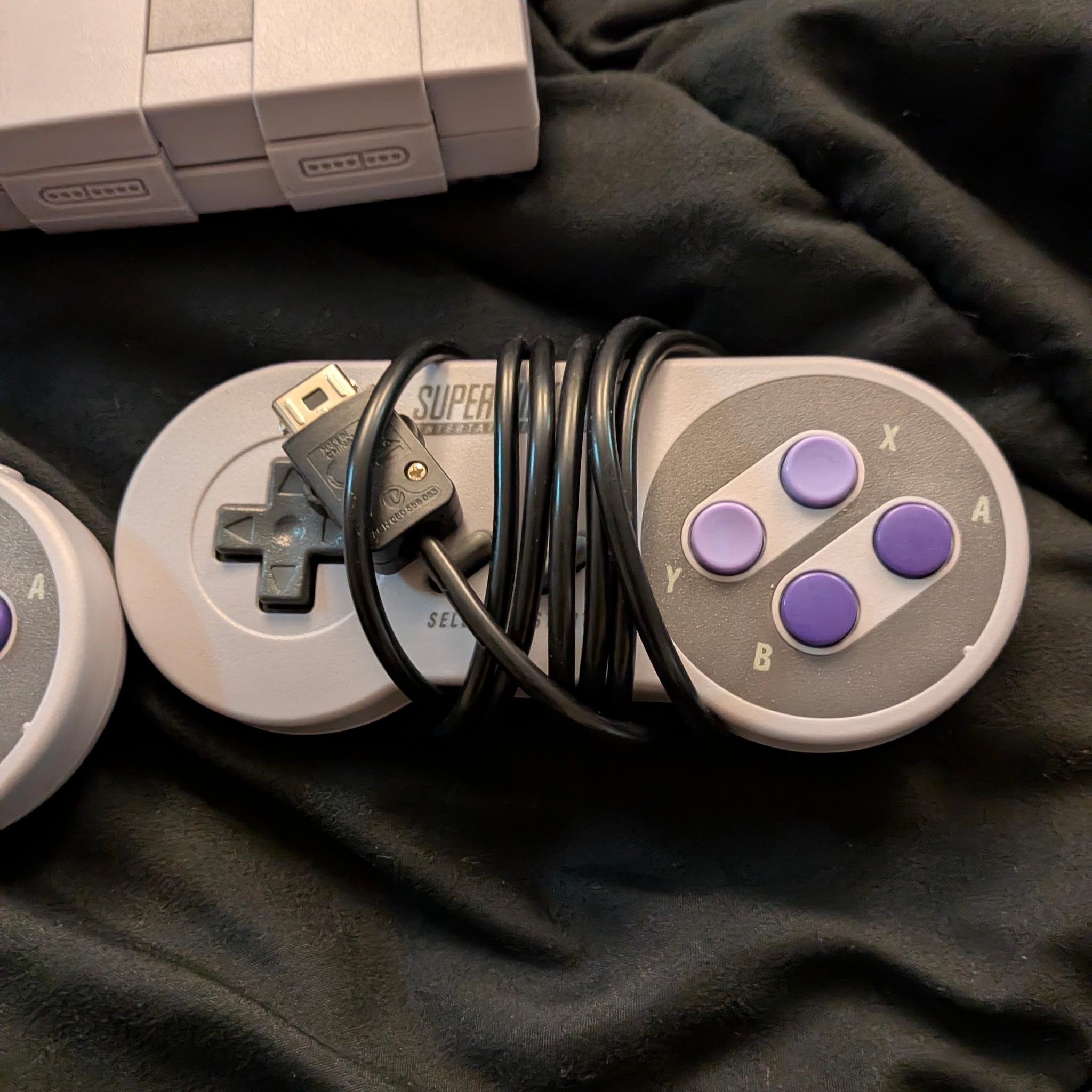 SNES classic, w/controllers and nintendo usb brick.