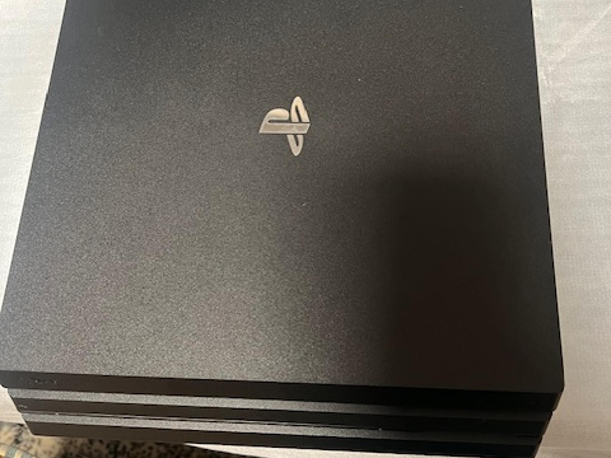 Sony Playstation 4 PRO 1 TB Console with 2 Games & 1 Controller