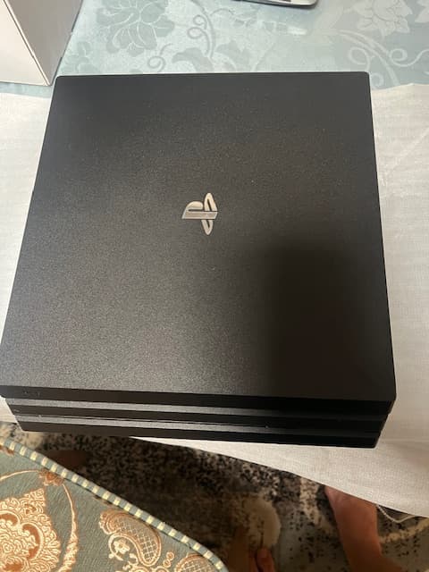 Sony Playstation 4 PRO 1 TB Console with 2 Games & 1 Controller