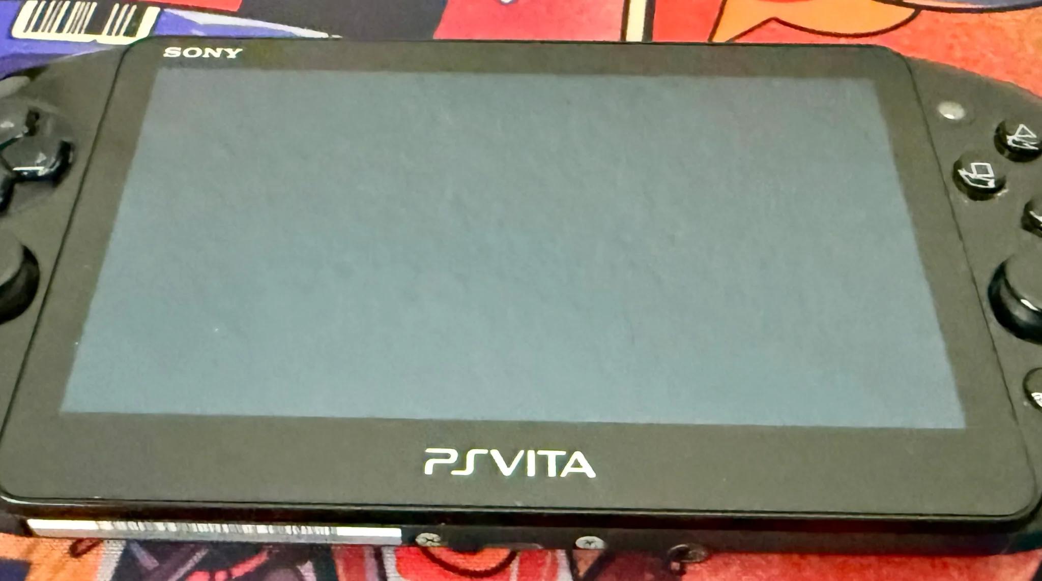 Near Mint | PSVita Console + 5 PSVita Games | PCH-2000