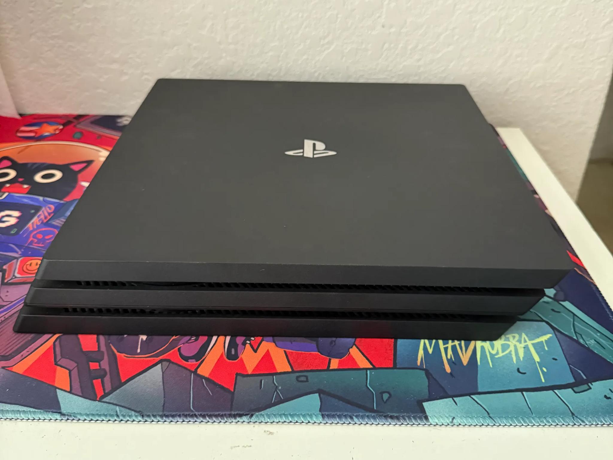 Sony PlayStation 4 Pro 1TB Console (Black) + 7 Games