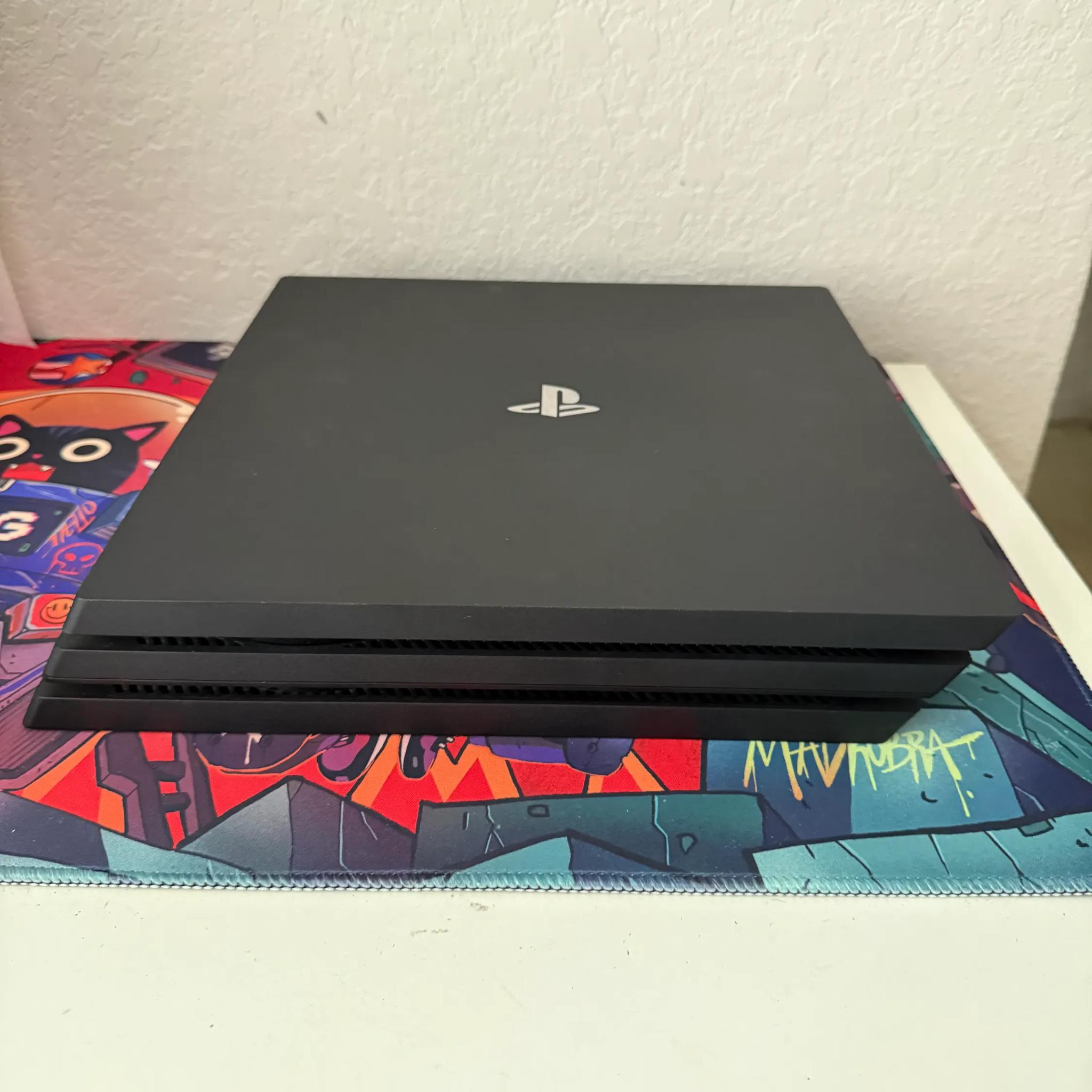 Sony PlayStation 4 Pro 1TB Console (Black) + 7 Games