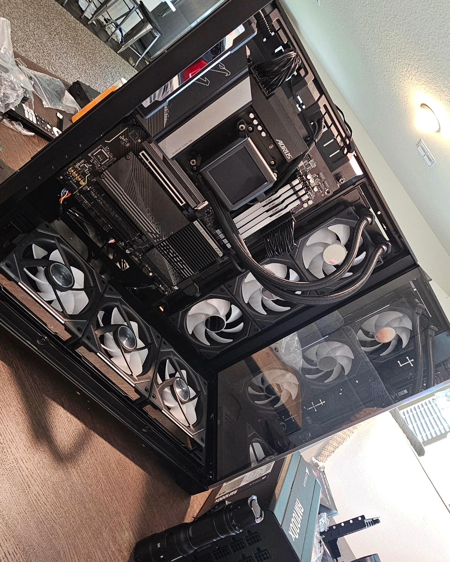 Custom retirement Lian Li full build, AMD 7800X3D with a Powercolor 7900XTX, 32GB of DDR5, 6TB