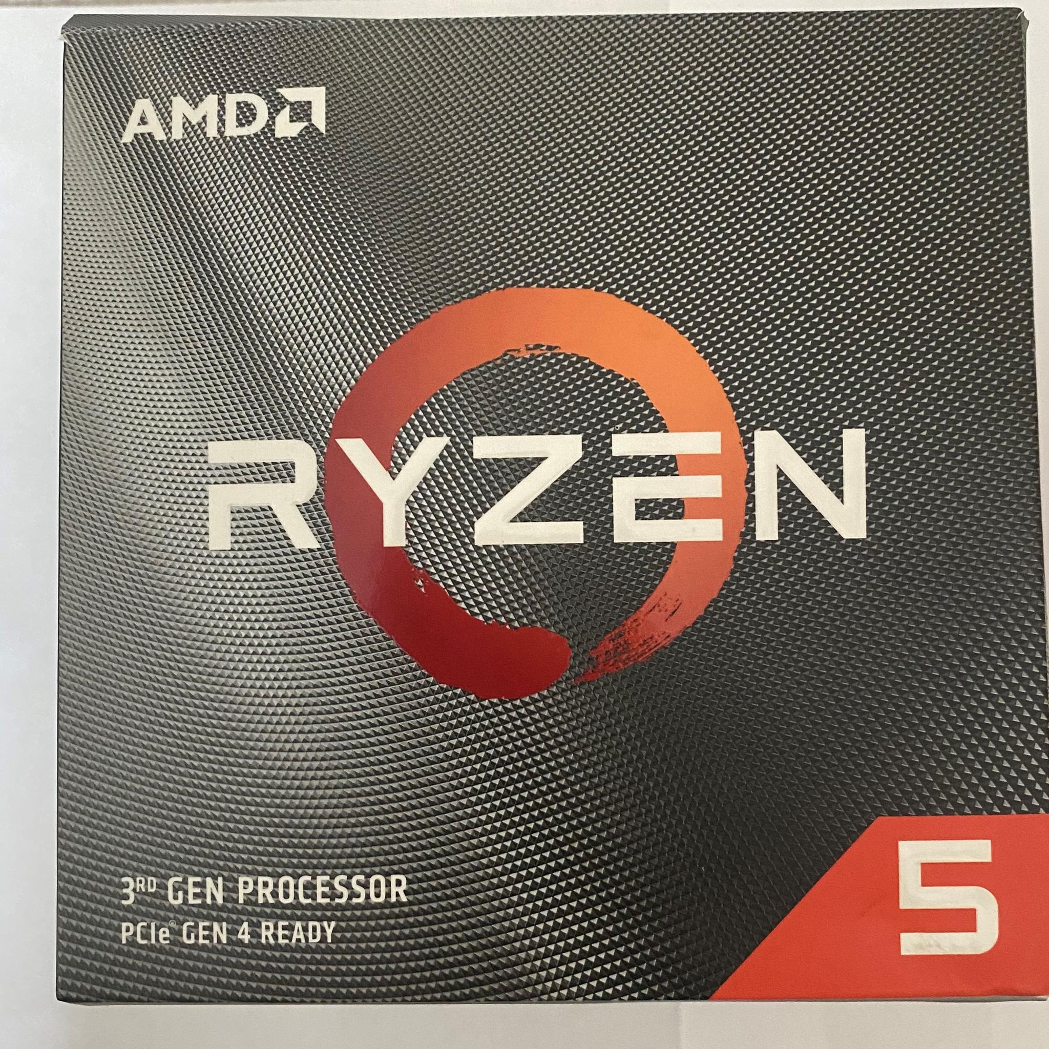 AMD Ryzen 5 3600XT 3.8 GHz 6-Core Processor and AMD Cooler in box.