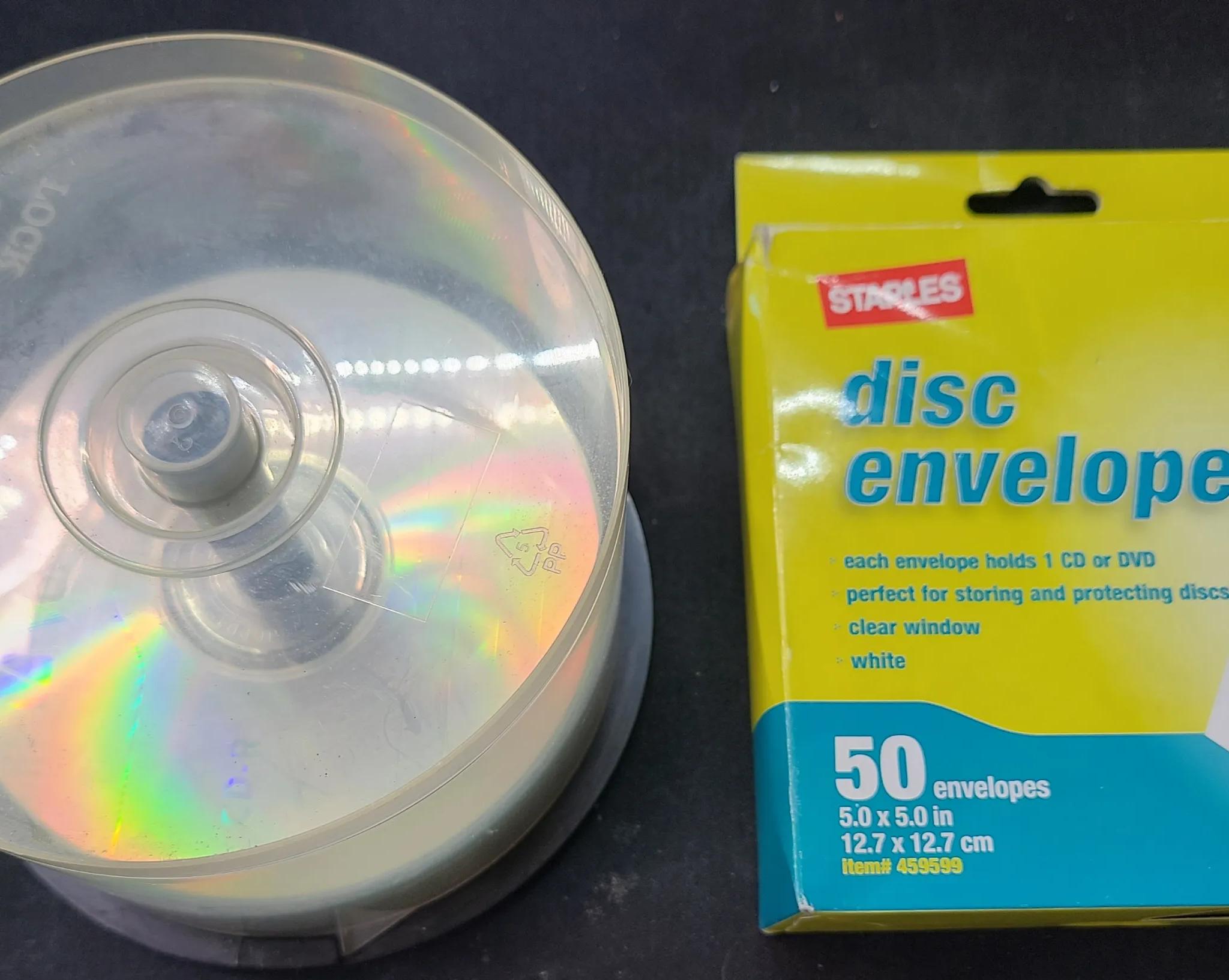 13 CD-R & 3DVD+R s and 50 Staples Disc Envelopes in box