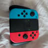 Nintendo Switch with Dock, Charger and controller base with 128GB SD card