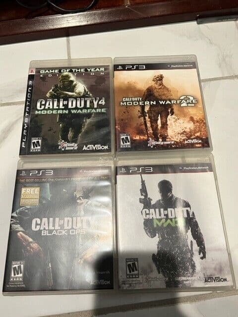 Sony PlayStation 3 Slim 120GB Console - Black 3 controllers 4 CALL OF DUTY GAMES