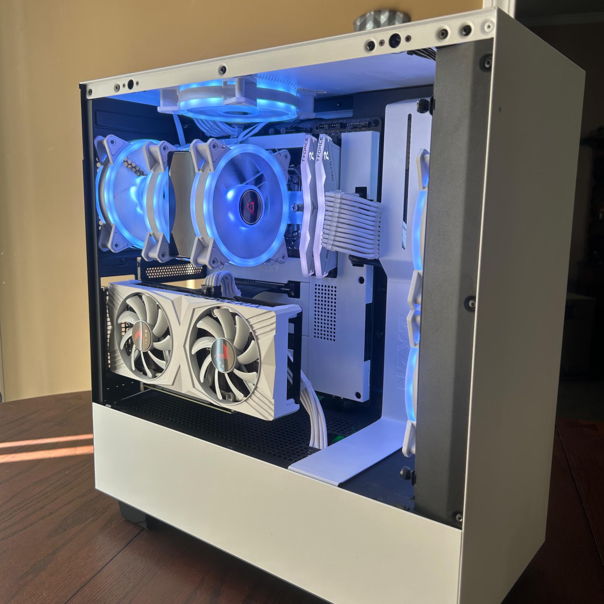 4060ti+12600k, 32GB Ram, 1TB NVME Ssd, vertical mounted, all white NZXT build.
