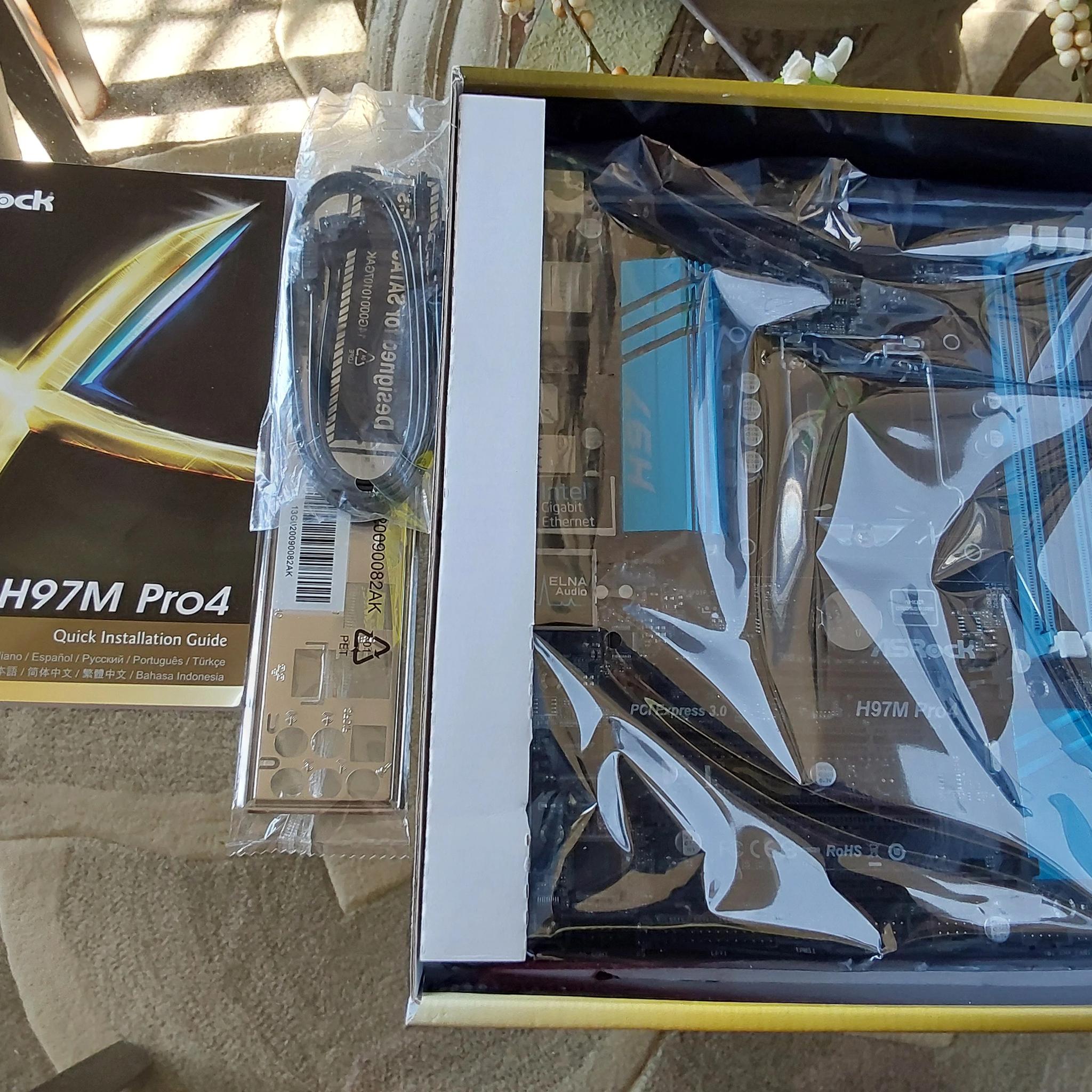 NEW ASRock Intel H97M Pro4 Motherboard, complete, sealed in original retail box