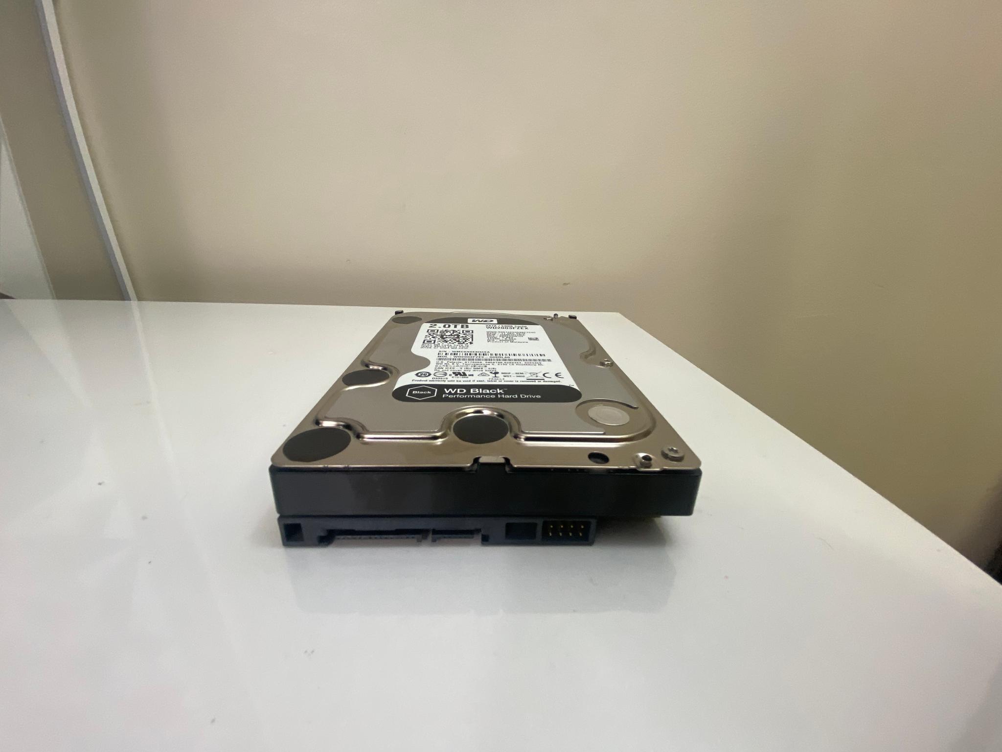 WD 2TB Hard Drive (HDD) – Fully Reset, Tested, Good Condition