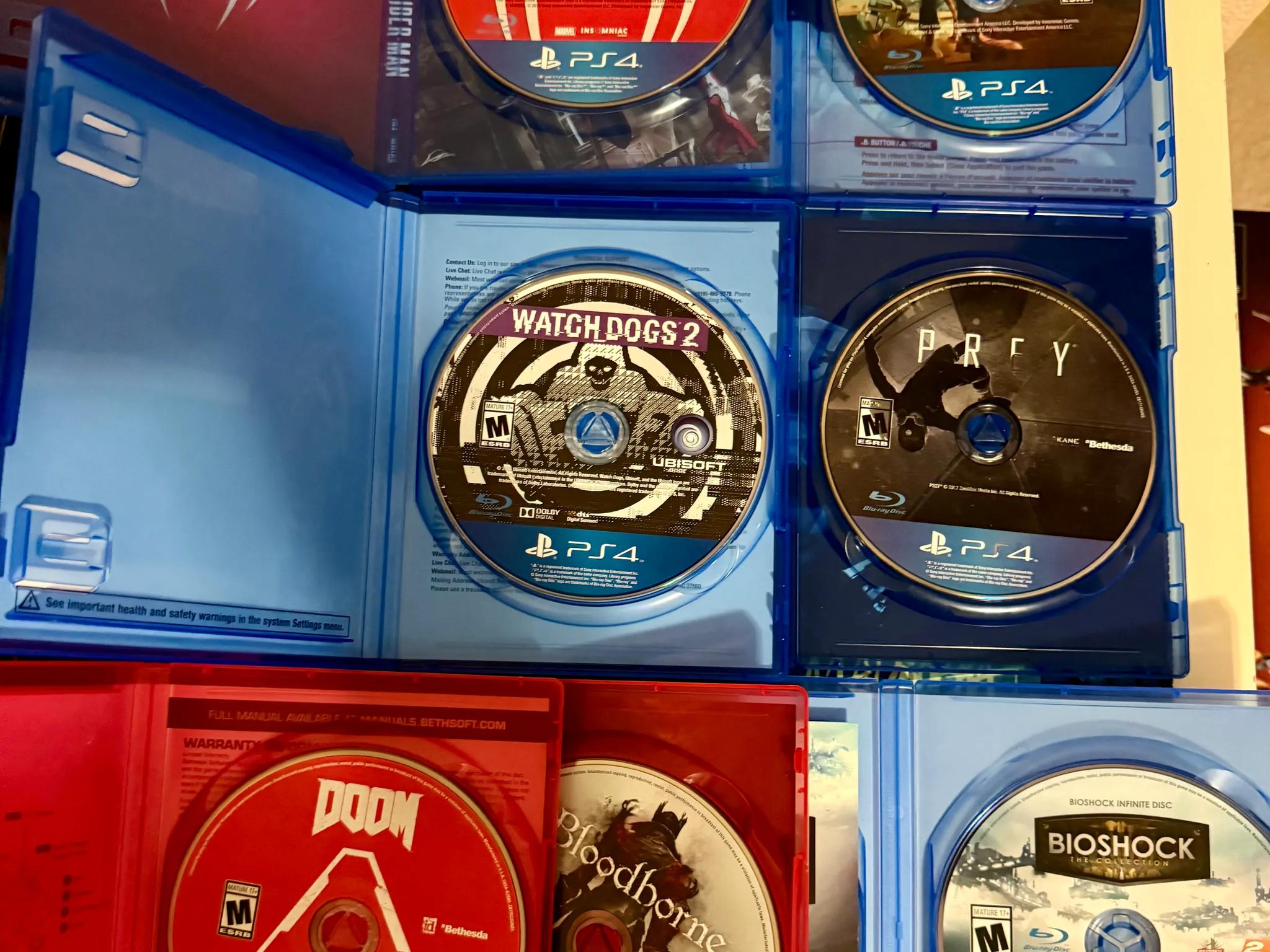 Sony PlayStation 4 Pro 1TB Console (Black) + 7 Games