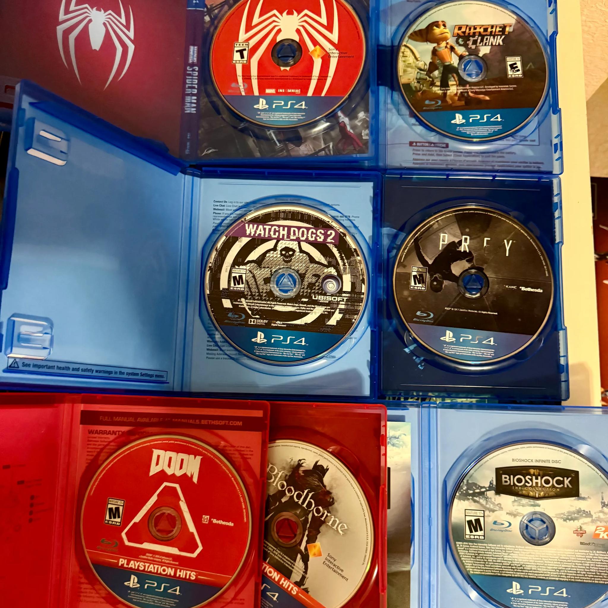 Sony PlayStation 4 Pro 1TB Console (Black) + 7 Games