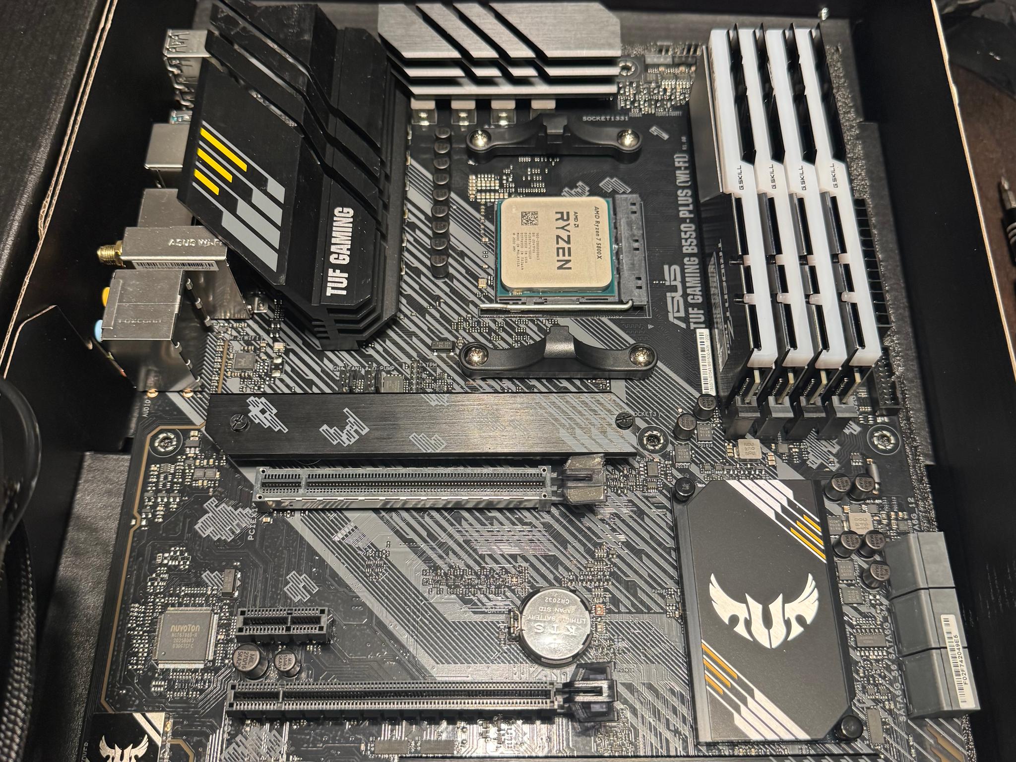 ASUS TUF B550 PLUS (WiFi) Gently used. Pictures show processor and ram on motherboard.(Not Included)