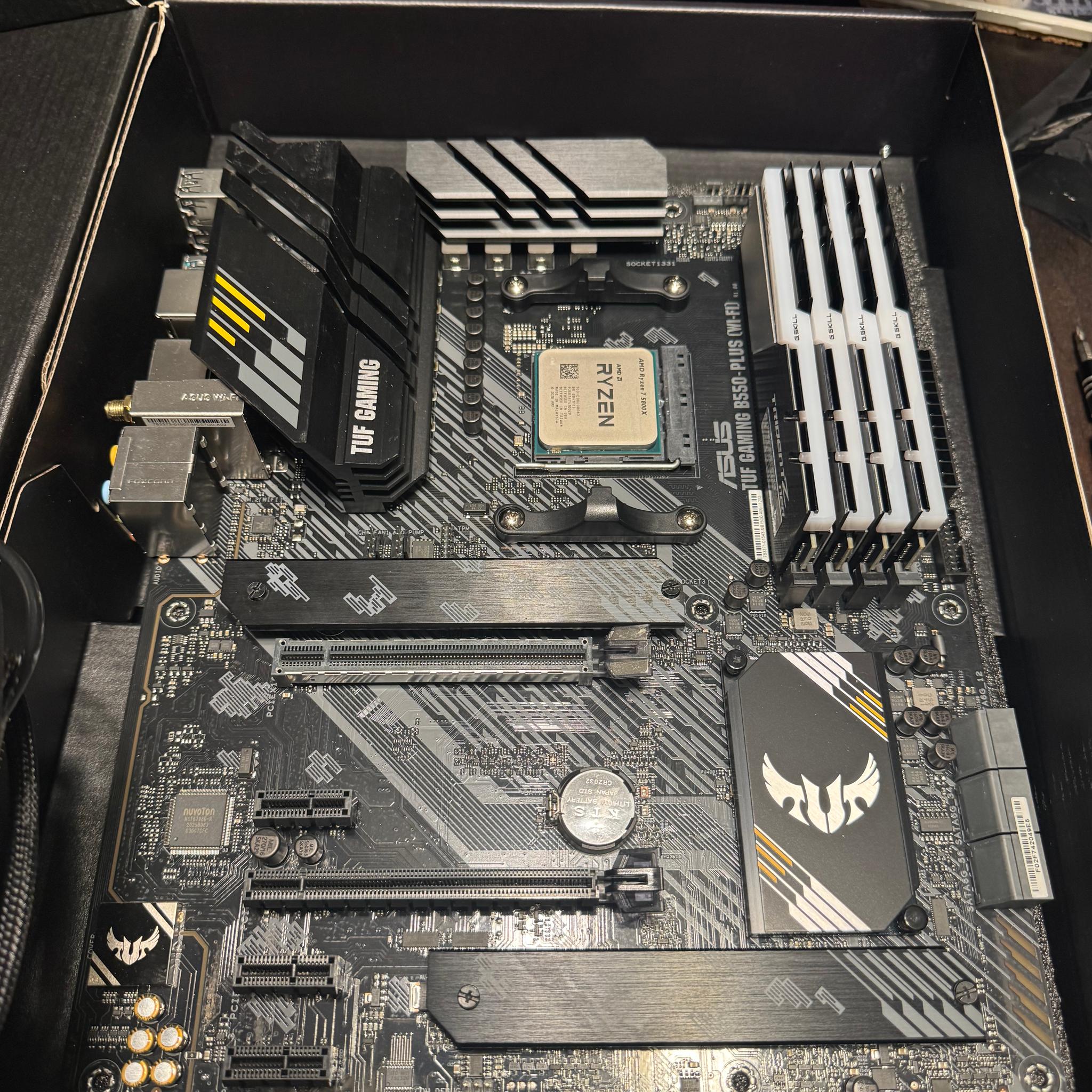 ASUS TUF B550 PLUS (WiFi) Gently used. Pictures show processor and ram on motherboard.(Not Included)