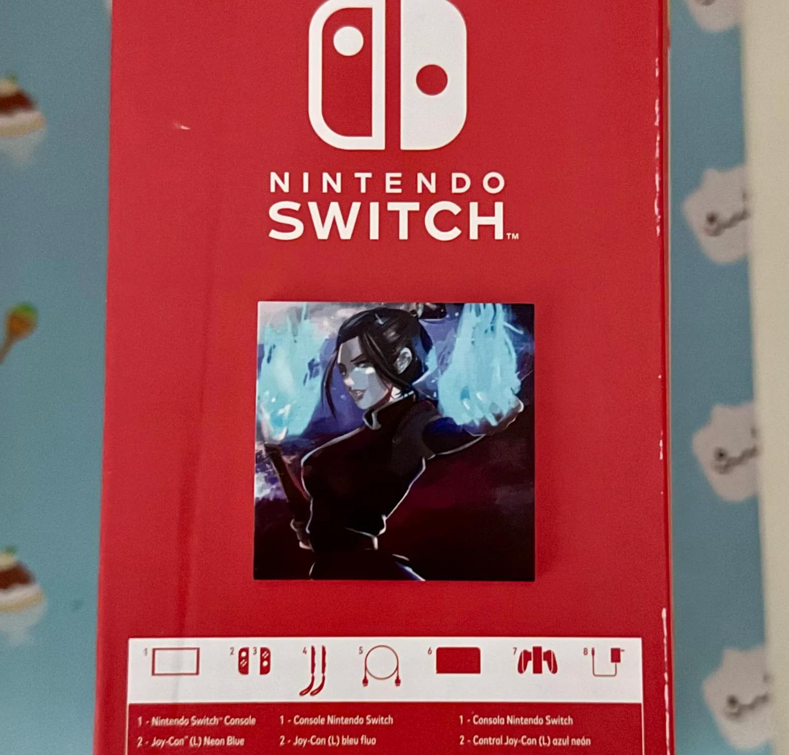 Nintendo Switch – OLED Model w/ Neon Red & Neon Blue Joy-Con