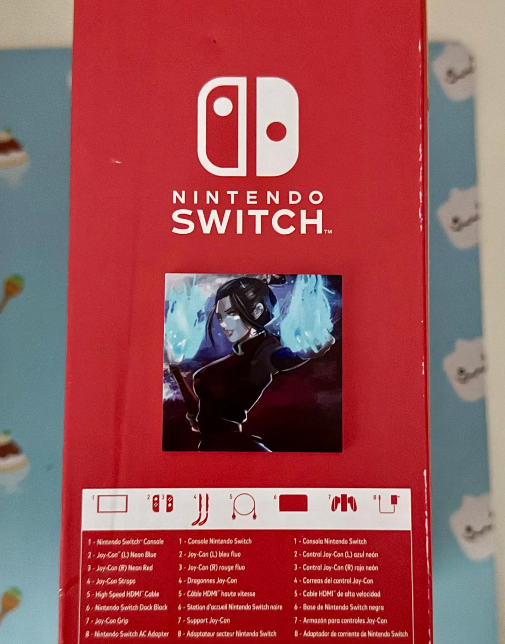 Nintendo Switch – OLED Model w/ Neon Red & Neon Blue Joy-Con