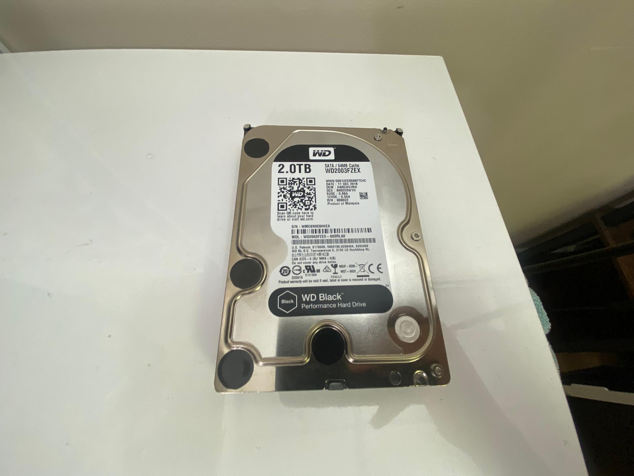 WD 2TB Hard Drive (HDD) – Fully Reset, Tested, Good Condition
