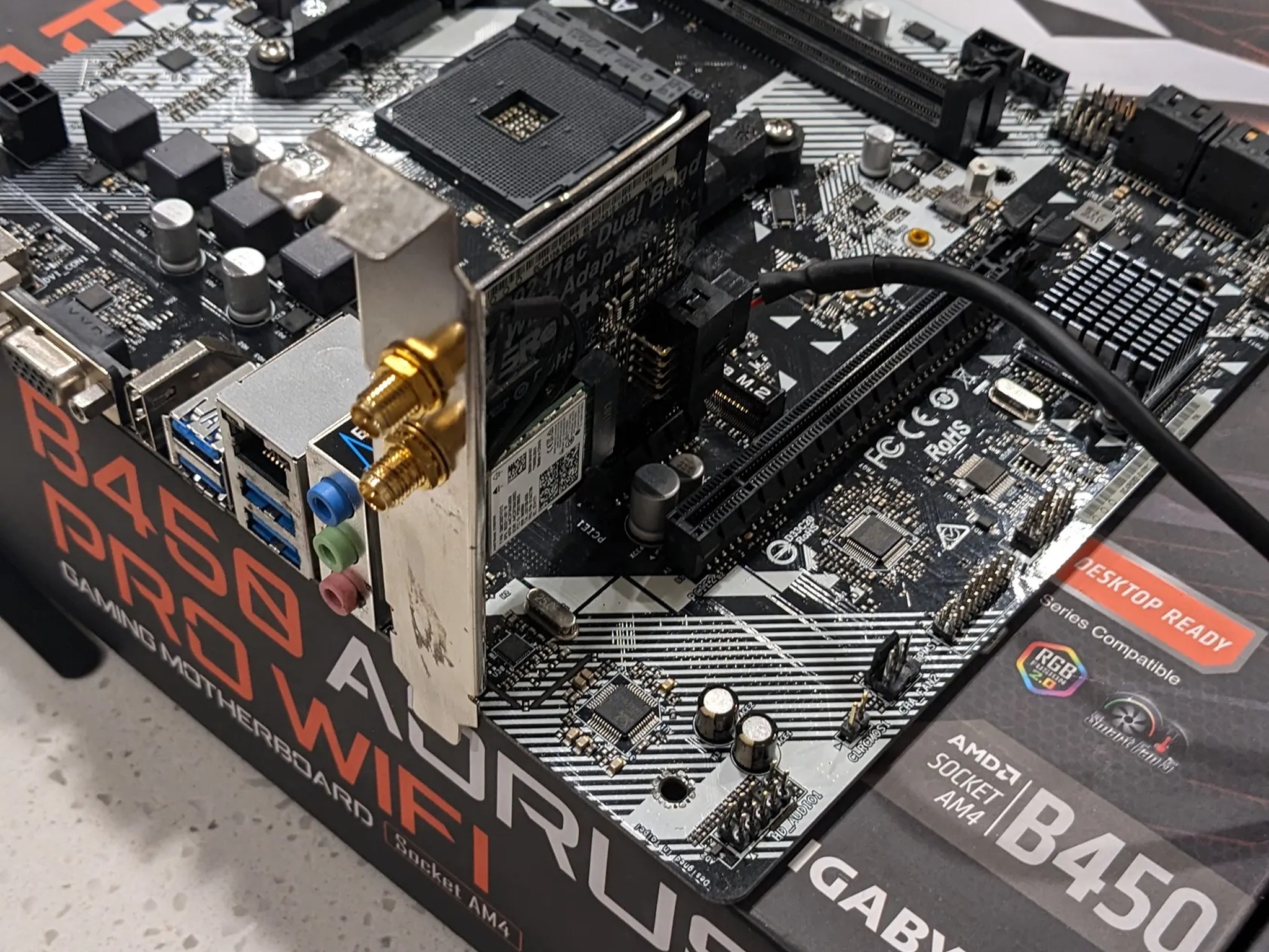 ASRock A320 AM4 micro ATX motherboard with wifi card