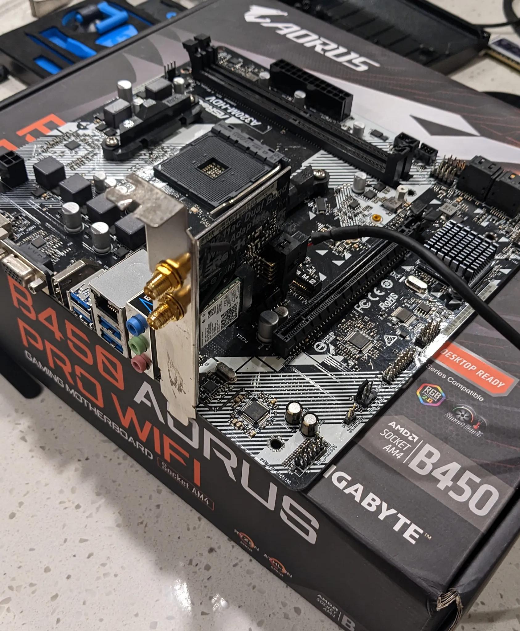 ASRock A320 AM4 micro ATX motherboard with wifi card