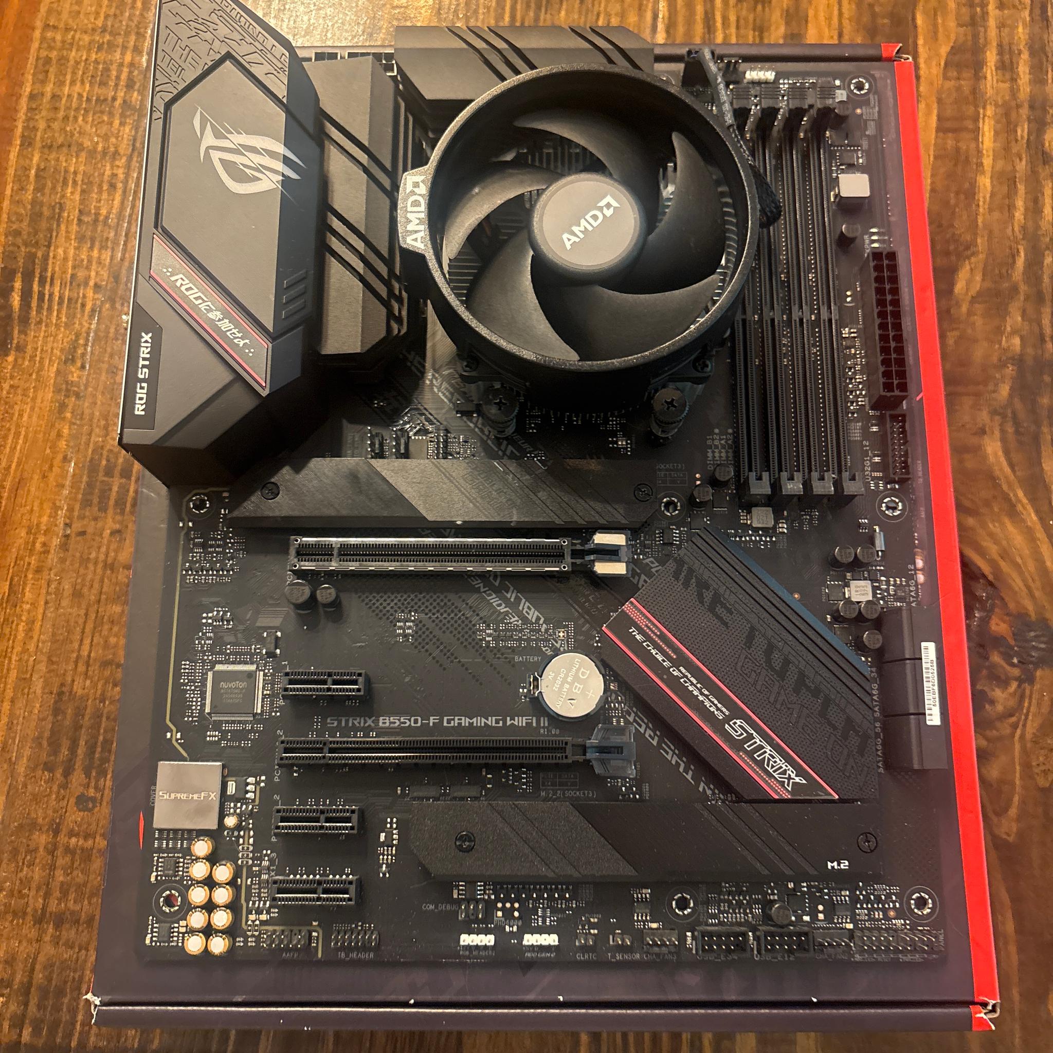 Used but good condition Rog motherboard and Ryzen 5 5500 CPU with stock AMD cooler
