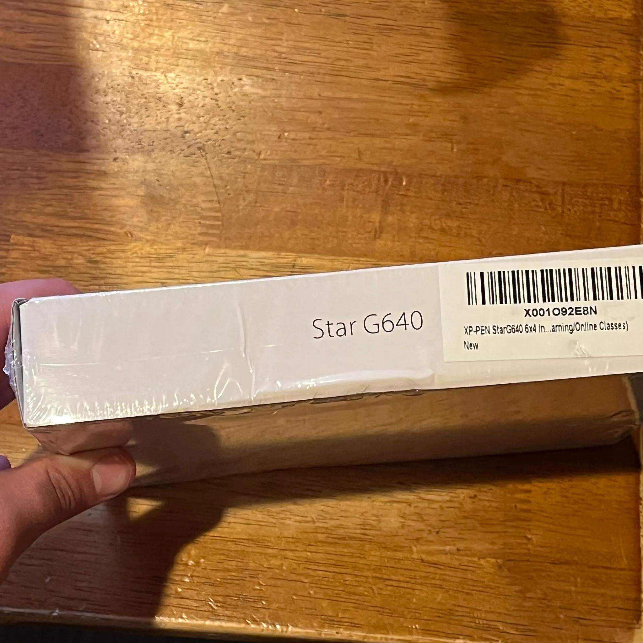 drawing pen/ tablet? Idk much about it, box has some dents but factory seal.