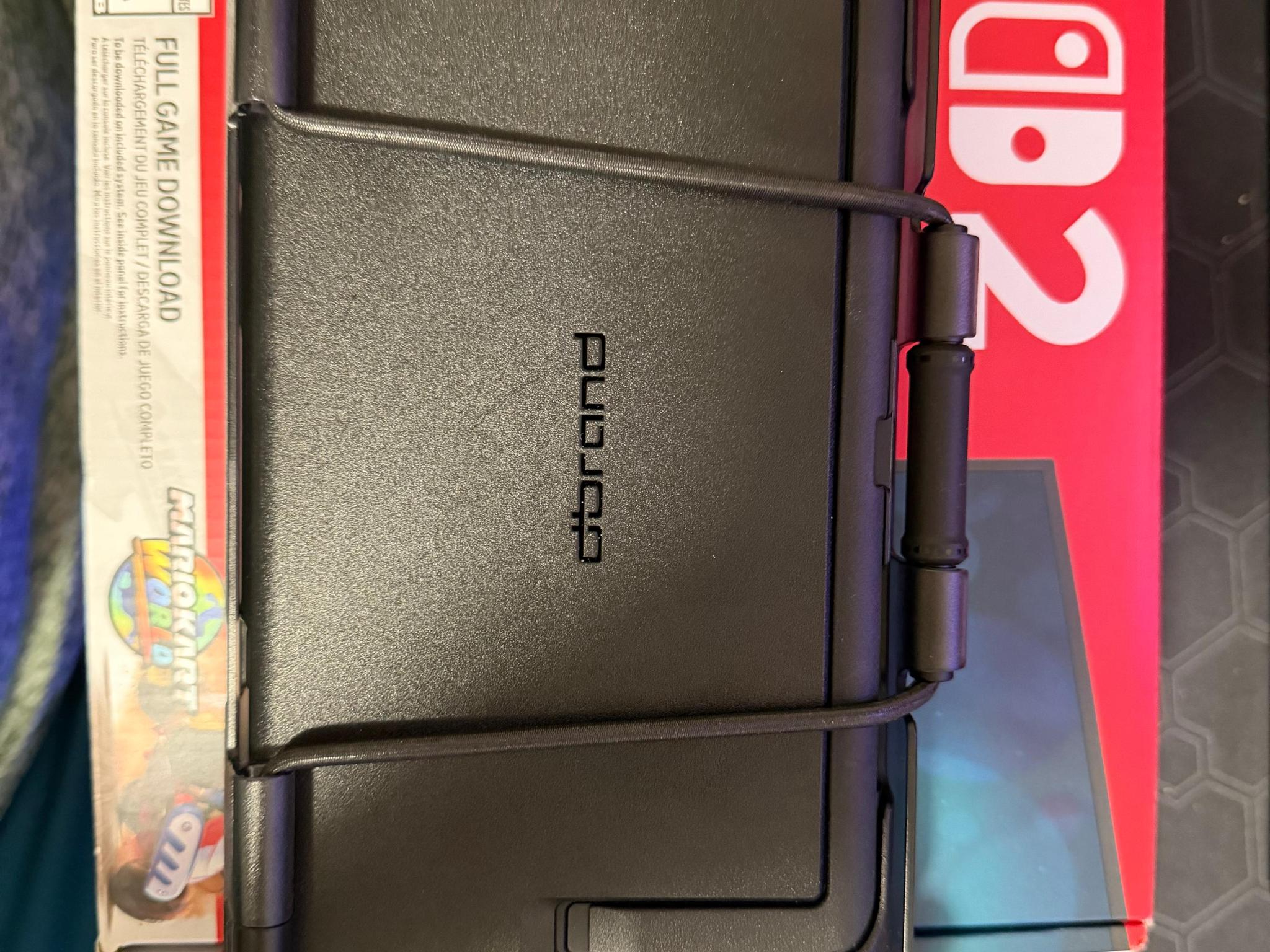 Nintendo switch 2 console with dBrand case and Donkey Kong Bonanza game