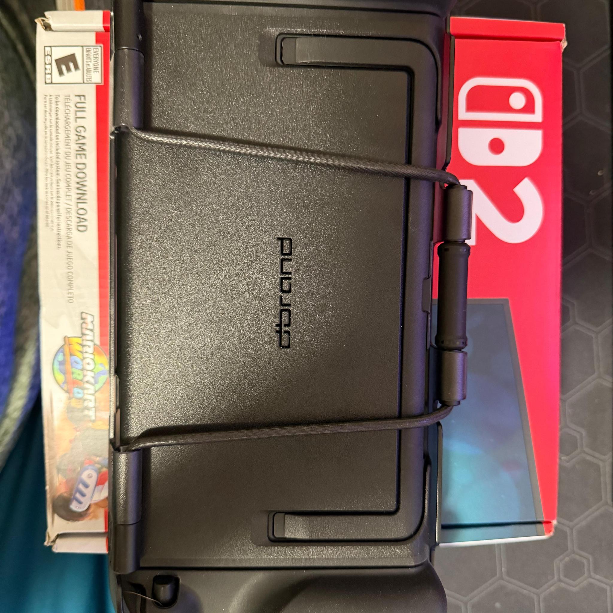 Nintendo switch 2 console with dBrand case and Donkey Kong Bonanza game