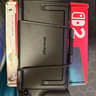 Nintendo switch 2 console with dBrand case and Donkey Kong Bonanza game