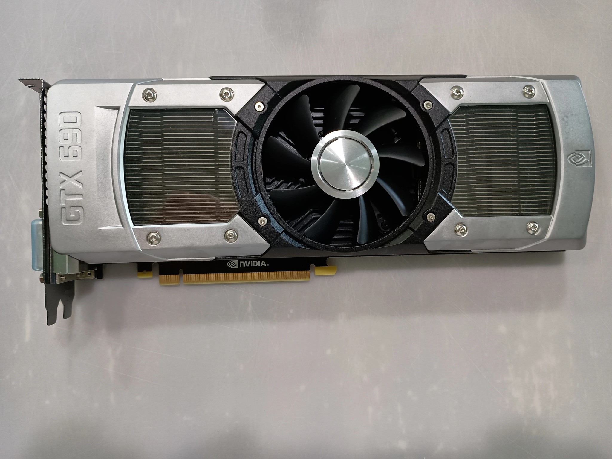 Two GTX 690 GPUs for Quad SLI (with SLI bridge). Tested, works well.