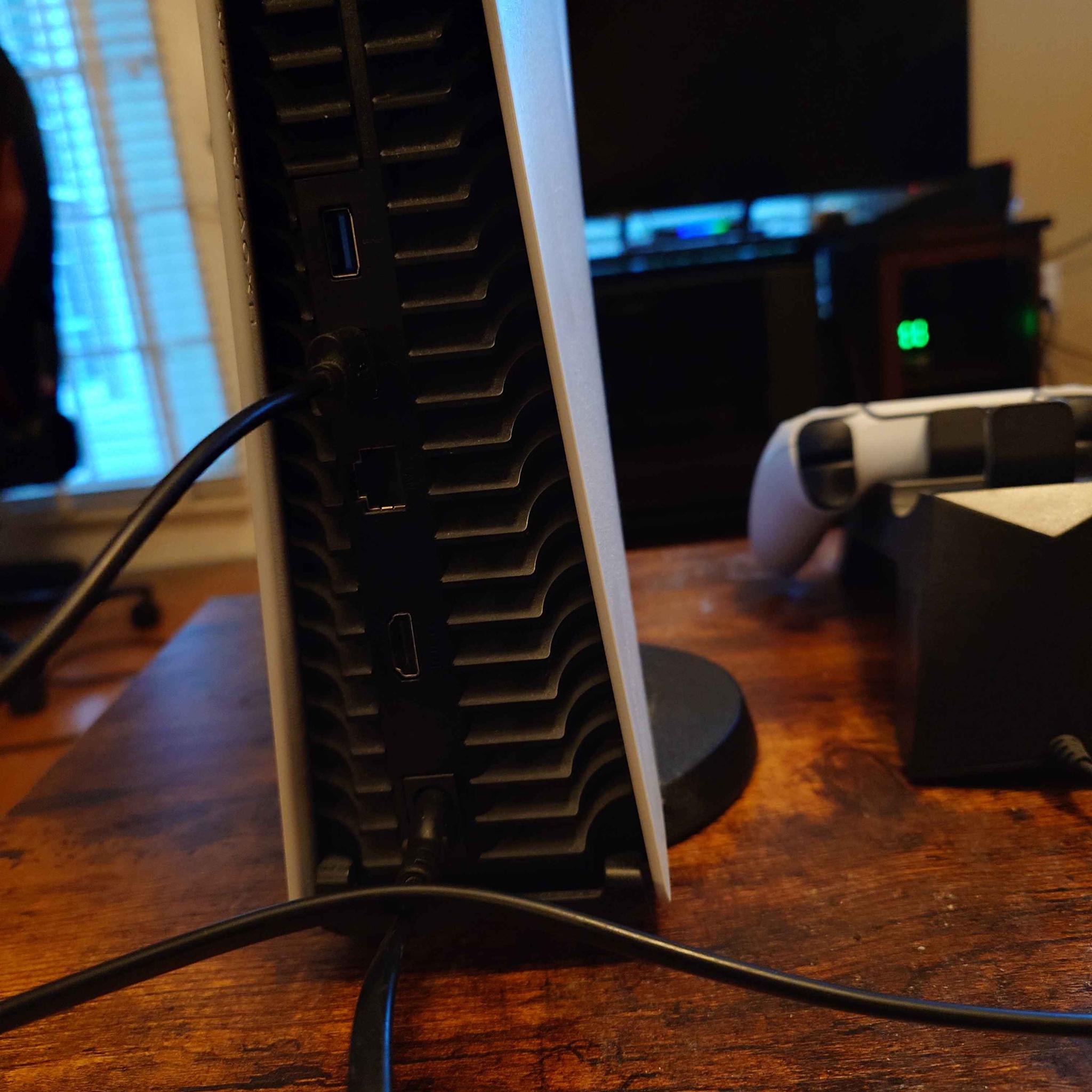 Playstation 5, with full cabling, controller, and controller charging dock