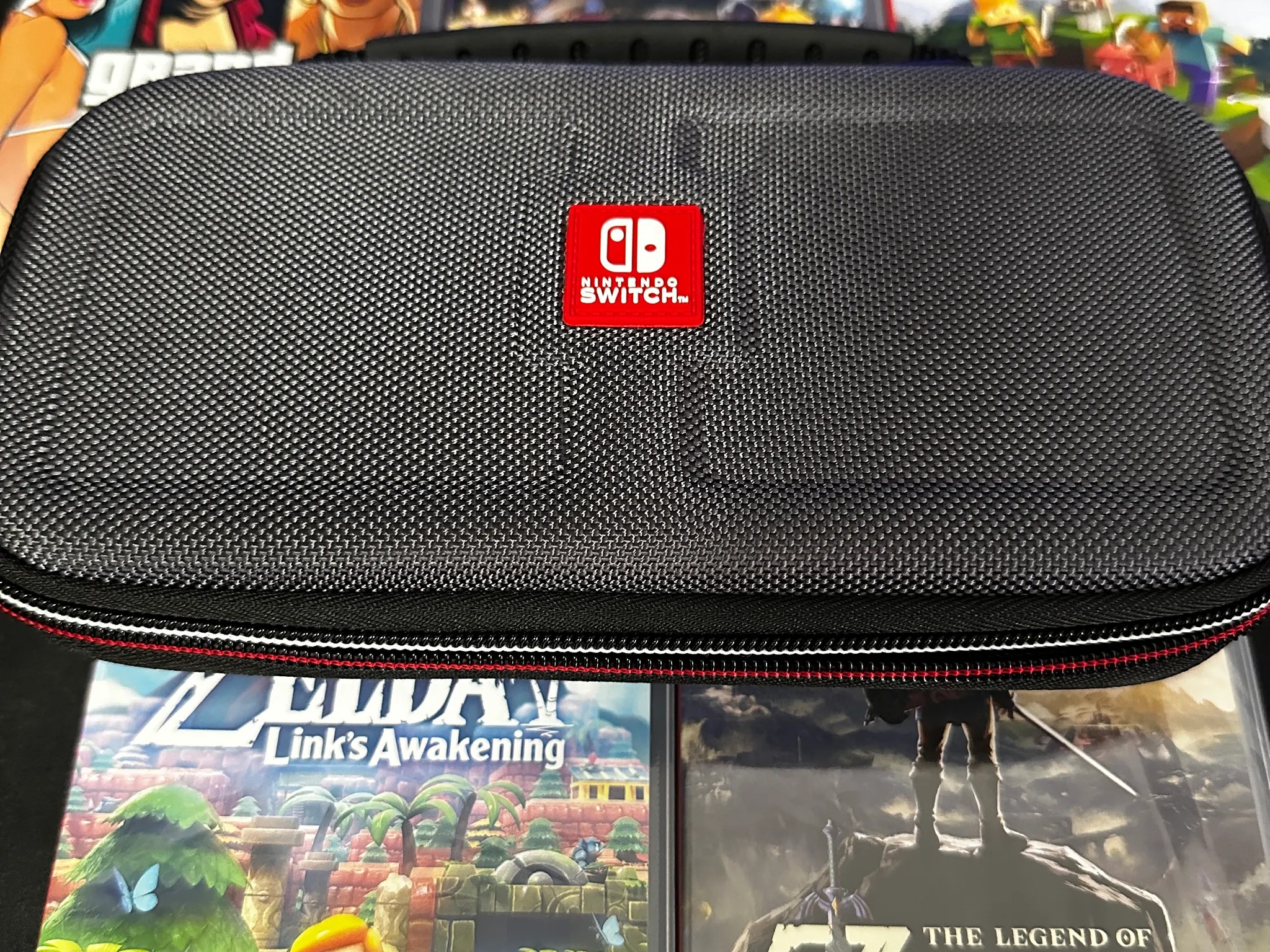 Nintendo Switch Lite 32GB (Blue) BUNDLE (Case + 5 Games Included)