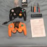 GameCube Controller Bundle (Orange & Smash Ultimate Black w/ Input Integrity Lossless Adapter)