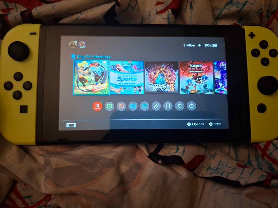 Nintendo Switch launch model with 512gb sd card, Ring fit adventure and other games installed