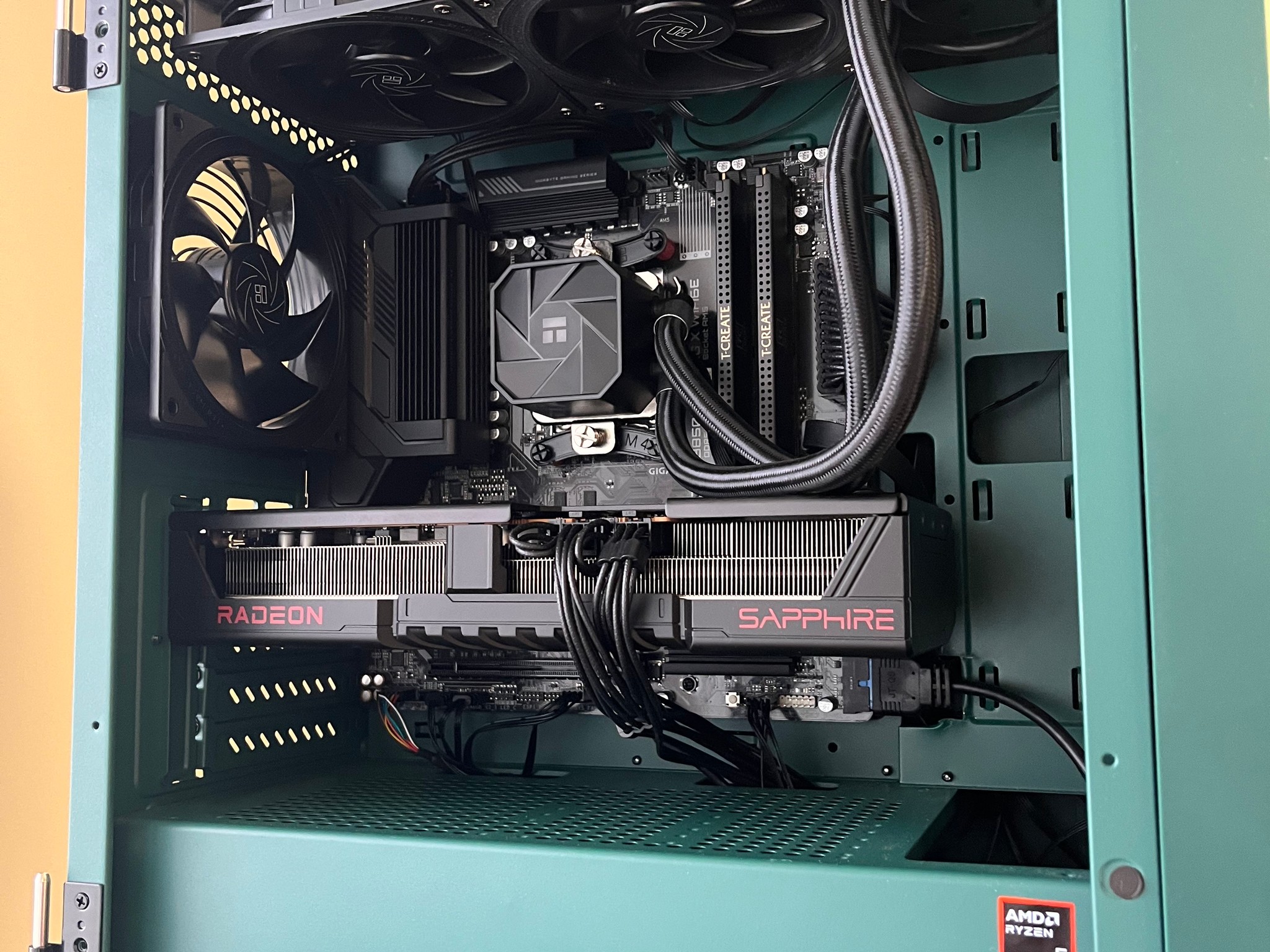GREEN GOBLIN!!! MicroATX build with AMD Ryzen 9600X and 9070, 32GB DDR5, 2TB SSD