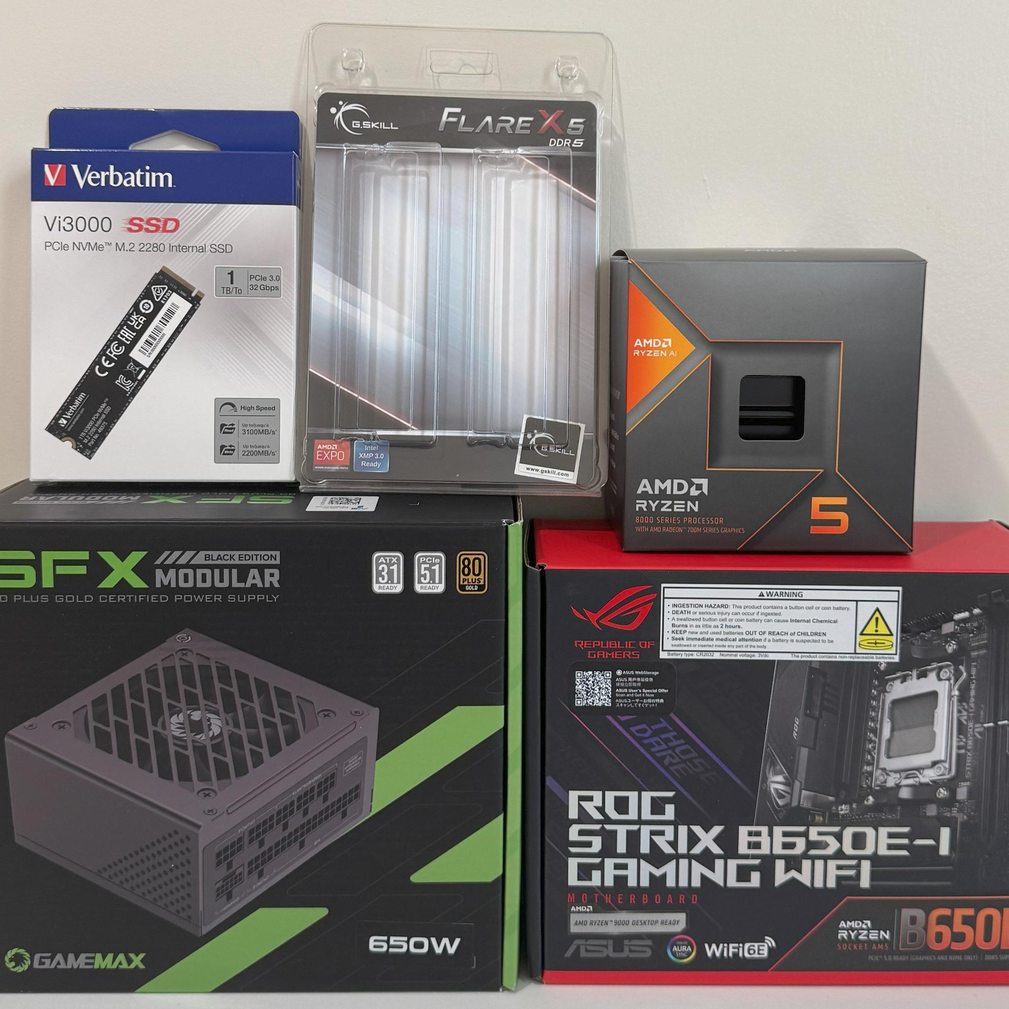AM5 Mini ITX PC AMD Ryzen 5 8600G ASUS ROG STRIX B650E-I 1TB SSD 32GB DDR5 Cooler Master NR200P V2