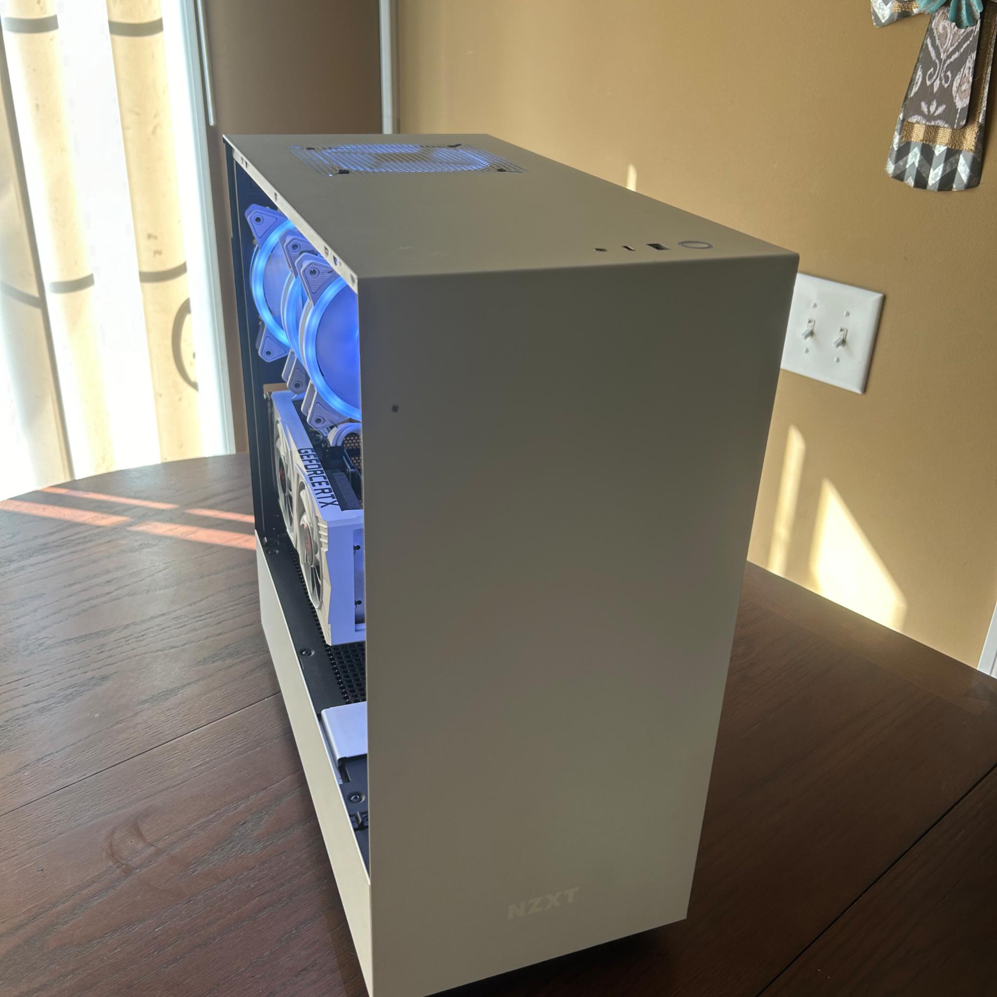 4060ti+12600k, 32GB Ram, 1TB NVME Ssd, vertical mounted, all white NZXT build.