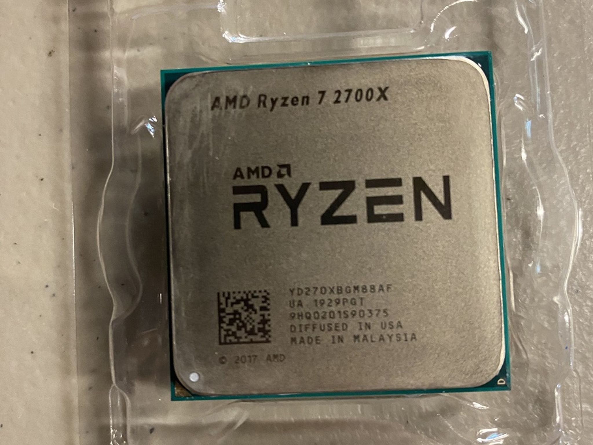 AMD Ryzen 7 2700x with Wraith Prism RGB cooler.