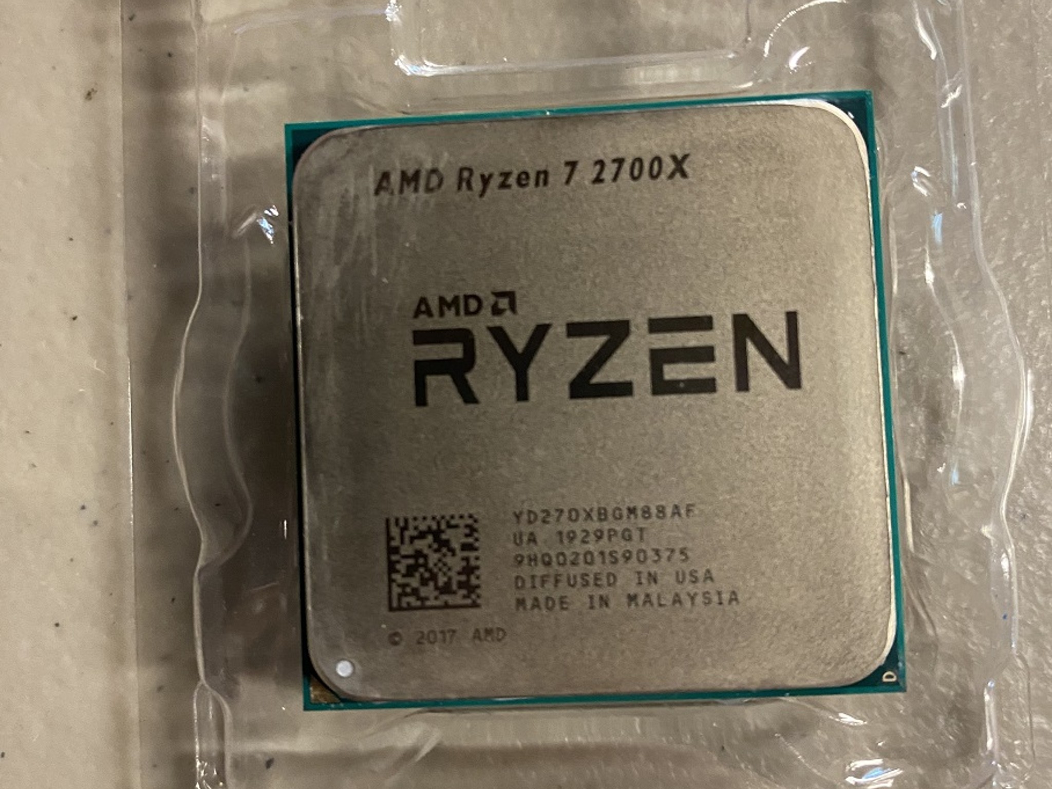 AMD Ryzen 7 2700x with Wraith Prism RGB cooler.