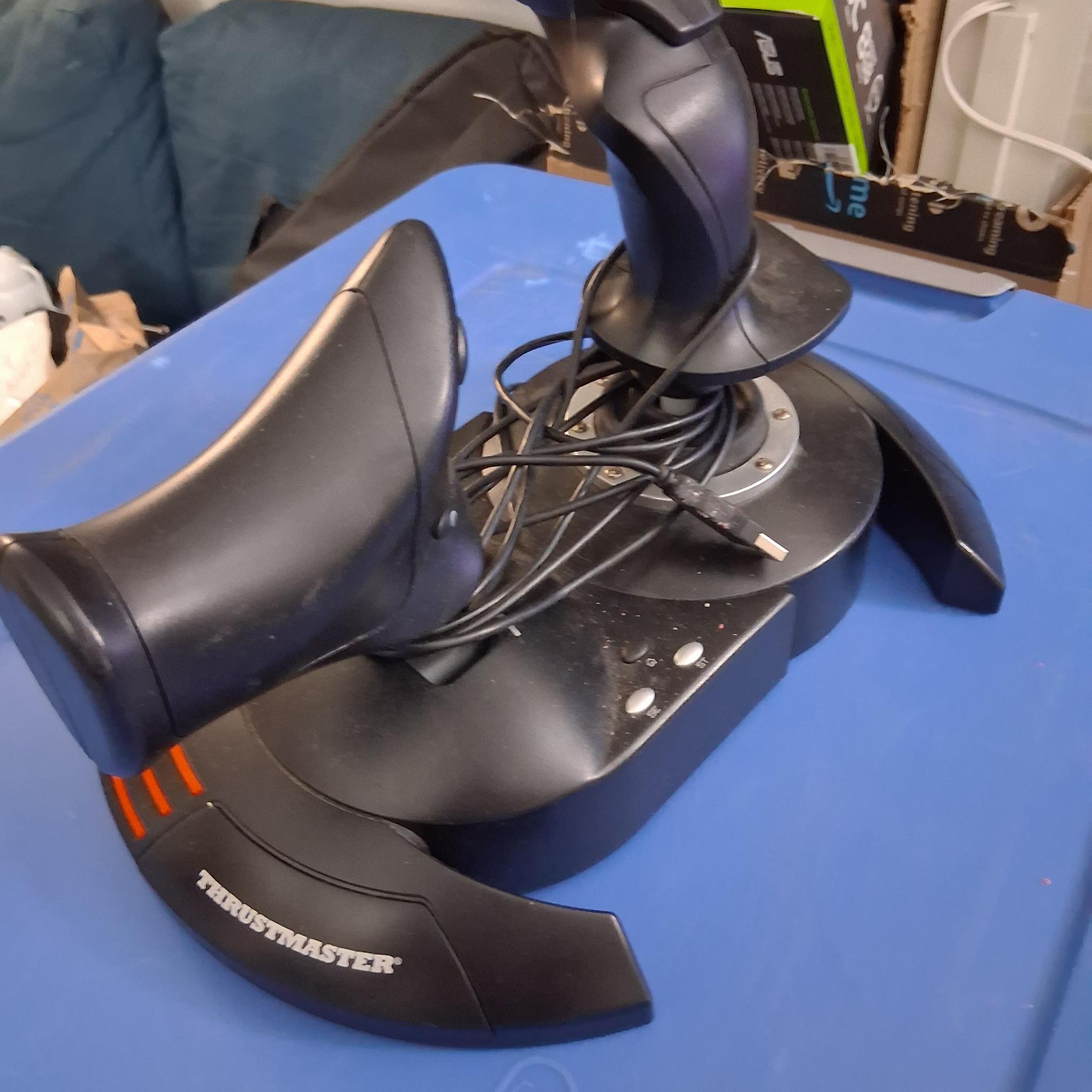 Thrustmaster T-Flight Hotas X — one-piece flight control system with twisty stick and throttle!