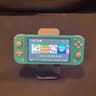 Nintendo Switch Lite Blue With Grip Case And Accessories