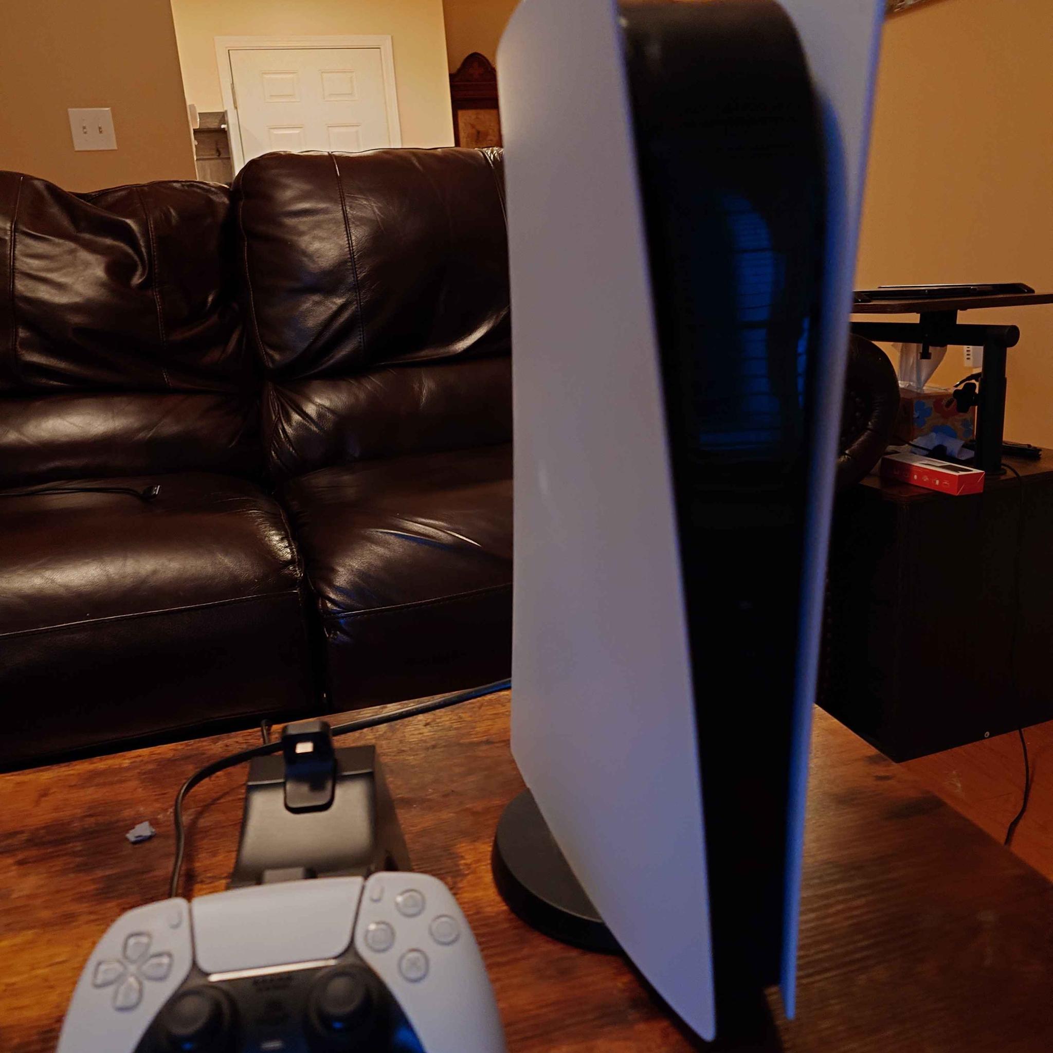 Playstation 5, with full cabling, controller, and controller charging dock