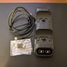 Wireless universal dual controller charger with adapters