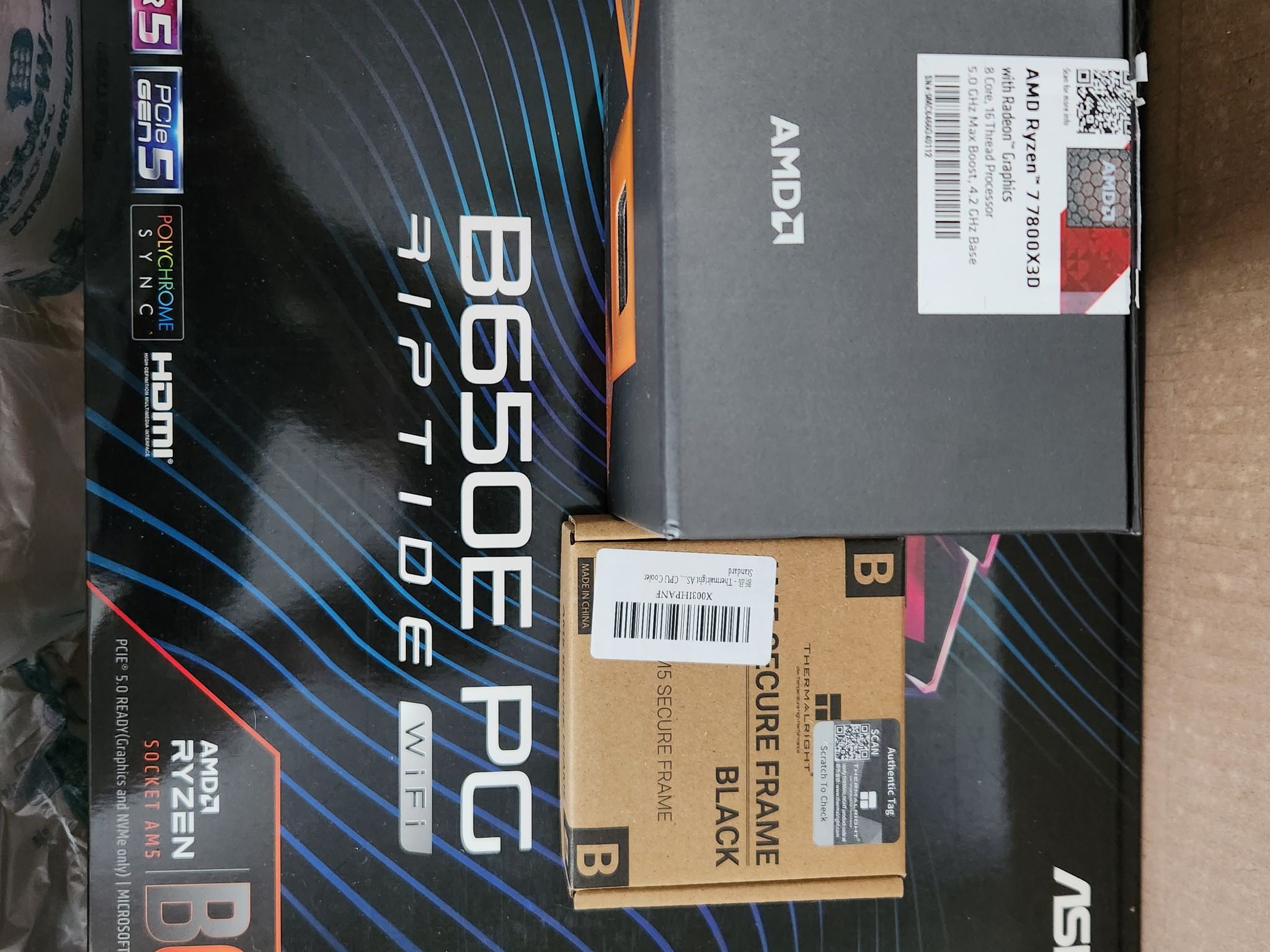AMD Ryzen 7 7800X3D + ASRock B650E PG Riptide WiFi + Thermaltake Contact Frame Bundle - MINT w/ All