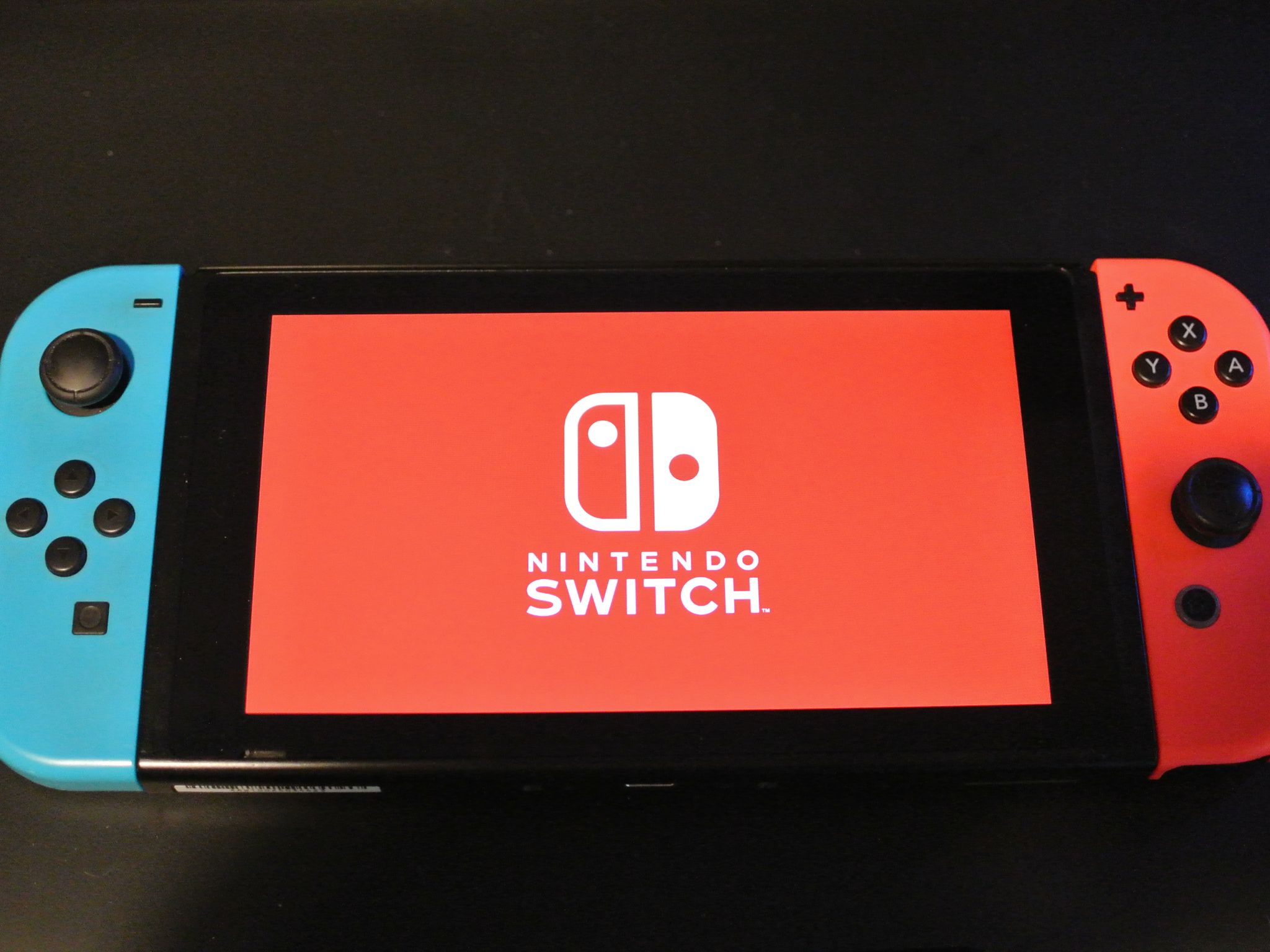 Nintendo Switch w/ Dock, Joycons, Grip and Travel Case