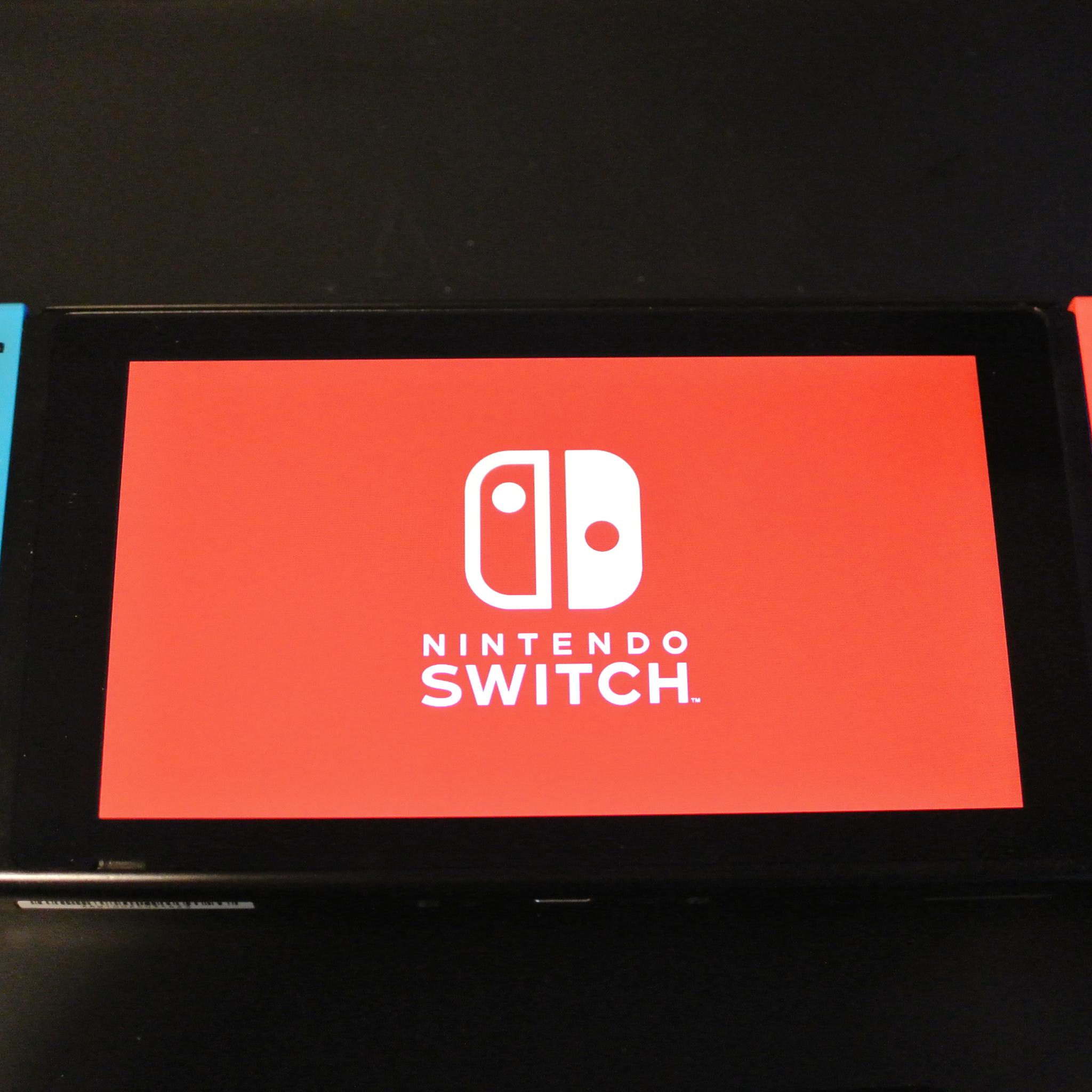 Nintendo Switch w/ Dock, Joycons, Grip and Travel Case