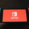 Nintendo Switch w/ Dock, Joycons, Grip and Travel Case