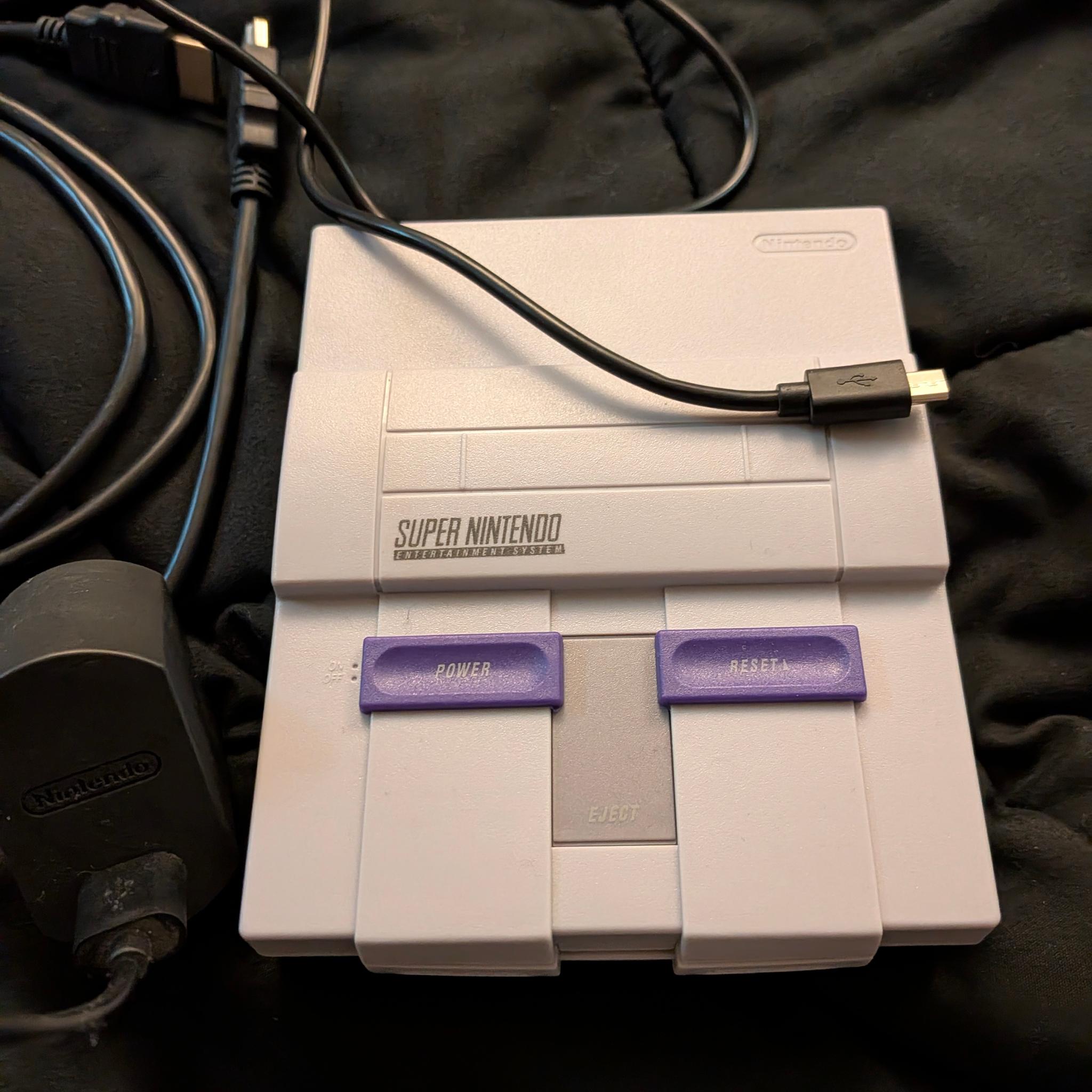 SNES classic, w/controllers and nintendo usb brick.