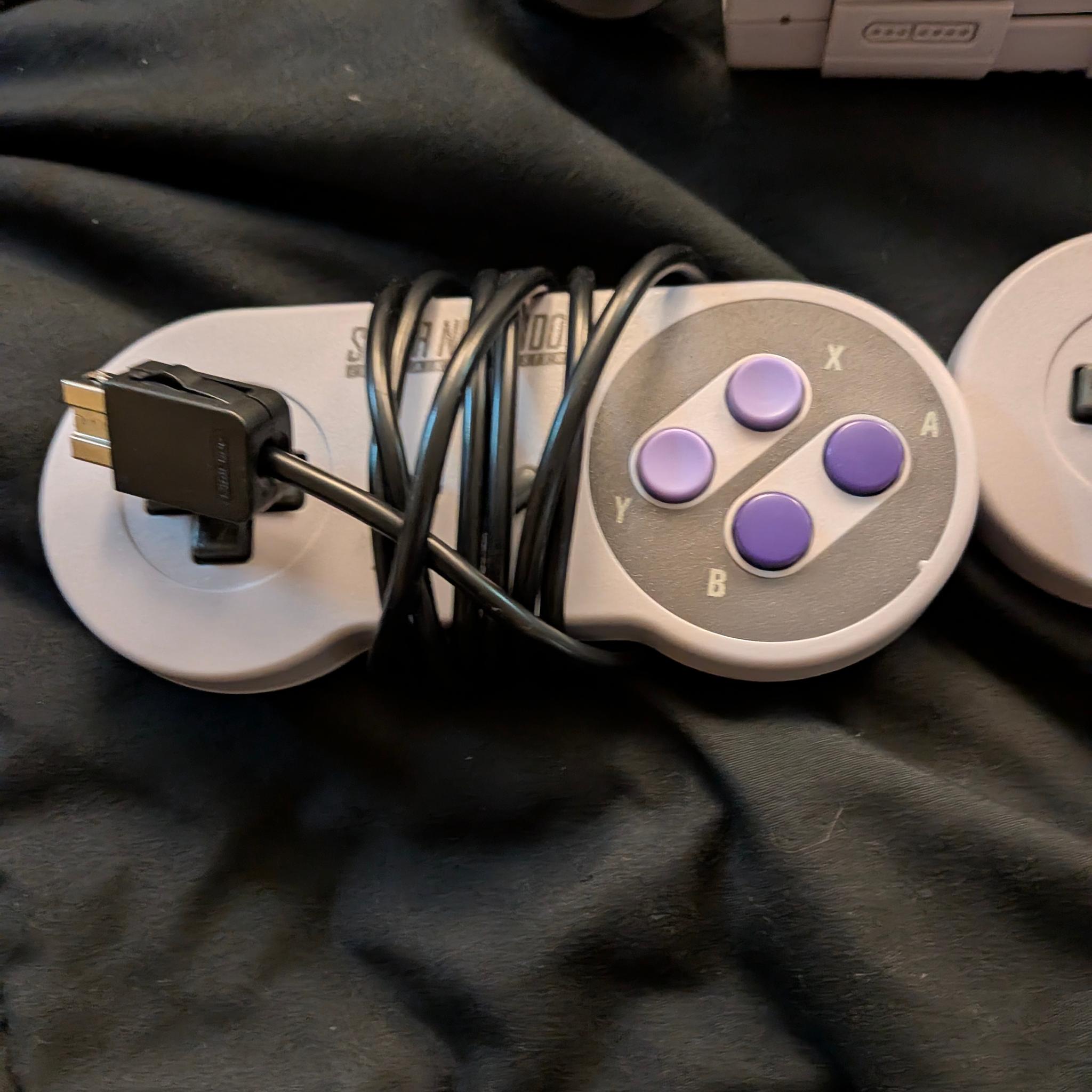 SNES classic, w/controllers and nintendo usb brick.