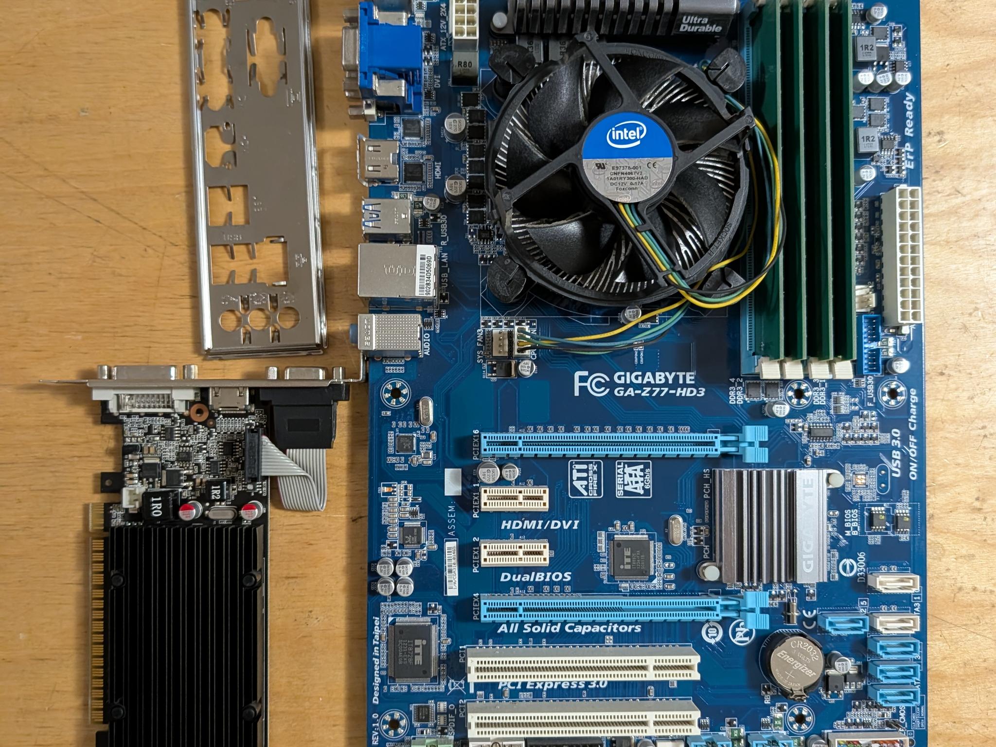 Core i7 3770 + Z77 motherboard + 16GB DDR3 + Nvidia GT210 1GB